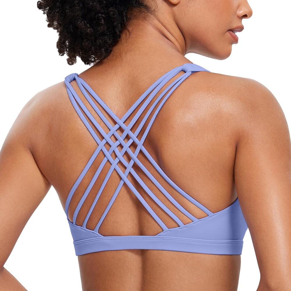 CRZ YOGA Naked Feeling Strappy Sports Bras for Women - Criss Cross Back Wireless Padded Cami Yoga... | Amazon (US)