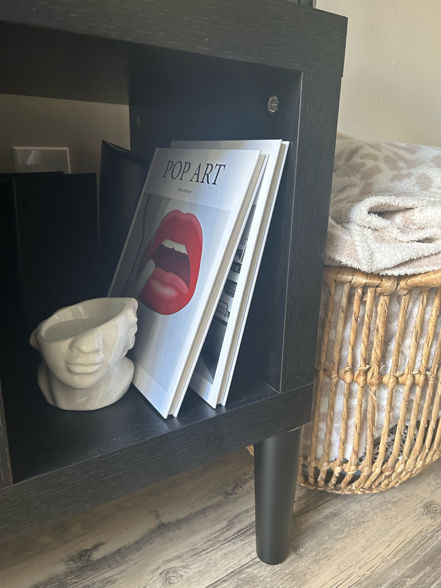 Fun coffee table/decor books and a cozy little corner. The exact candle is sold out at H&M but linked a dupe! #cozythrowblanket #coffeetablebooks #shelfdecor 

#LTKhome #LTKunder50 #LTKunder100