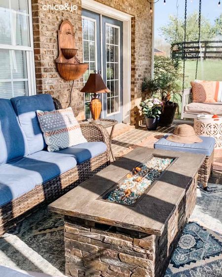 Get ready for long summer days by outfitting your screened porch with comfortable furniture including a fire table for chilly nights  

#LTKhome