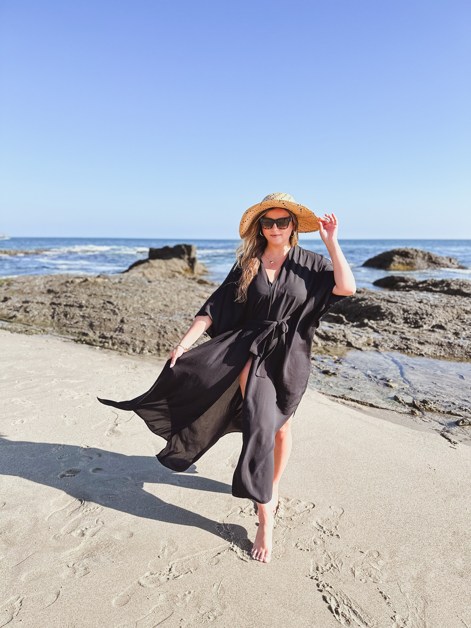 { a long black cover up, sun hat, and great sunglasses make for a great beach day 🐚👙🌴 }

#LTKstyletip #LTKswim #LTKsalealert