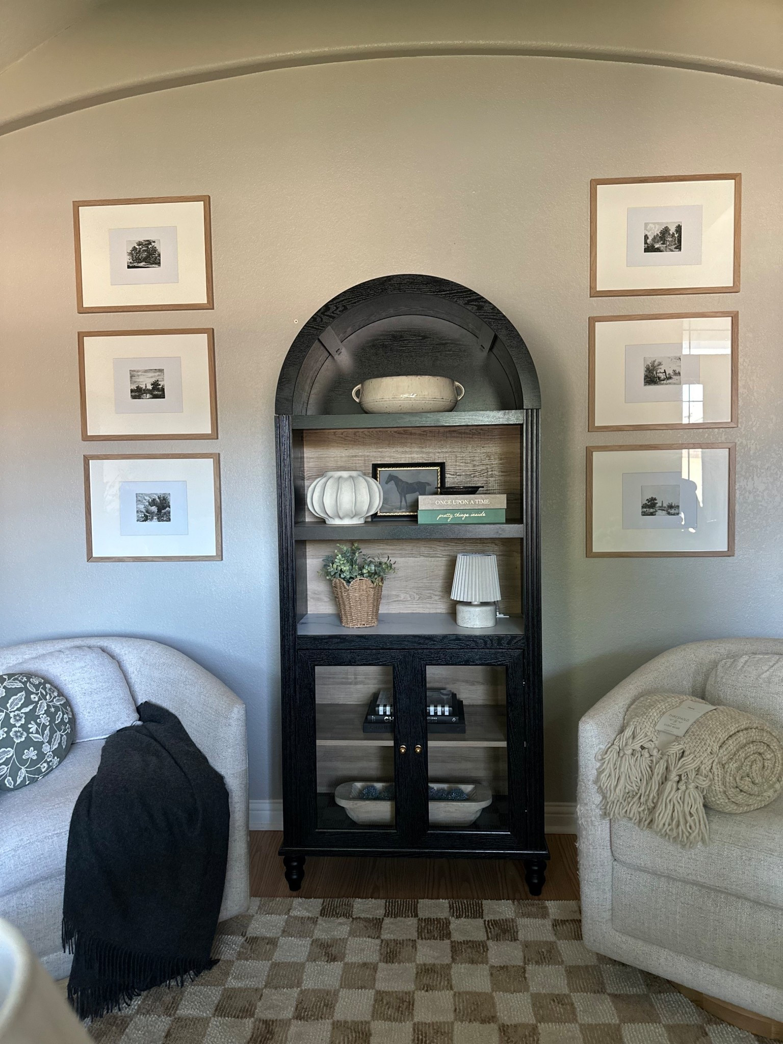 New arched cabinet that I’m in LOVE with in our sitting room! I’ve always wanted one and this one is stunning! 🖤🖤🖤

#LTKHome