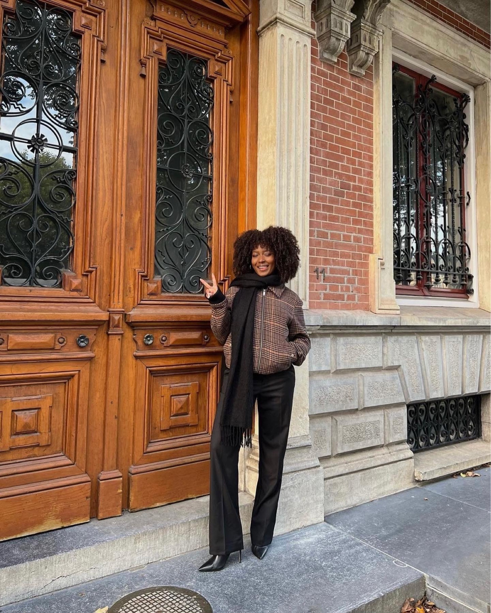 fall outfit classy elegant look stiletto boots heels black trousers dressy bomber jacket checkered scarf 

#LTKstyletip #LTKeurope #LTKSeasonal