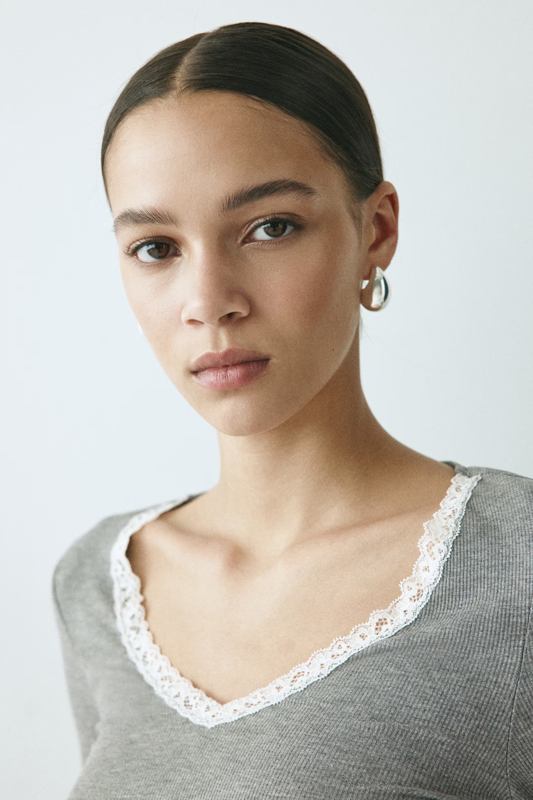 Lace-trimmed jersey top | H&M (UK, MY, IN, SG, PH, TW, HK)