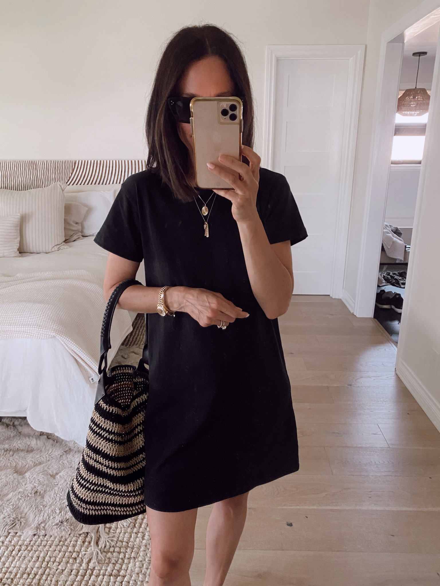 Basic black t-shirt dress. Great for casual summer days: I’m wearing my regular size, but if you want it more oversized I recommend sizing up. 

#LTKstyletip