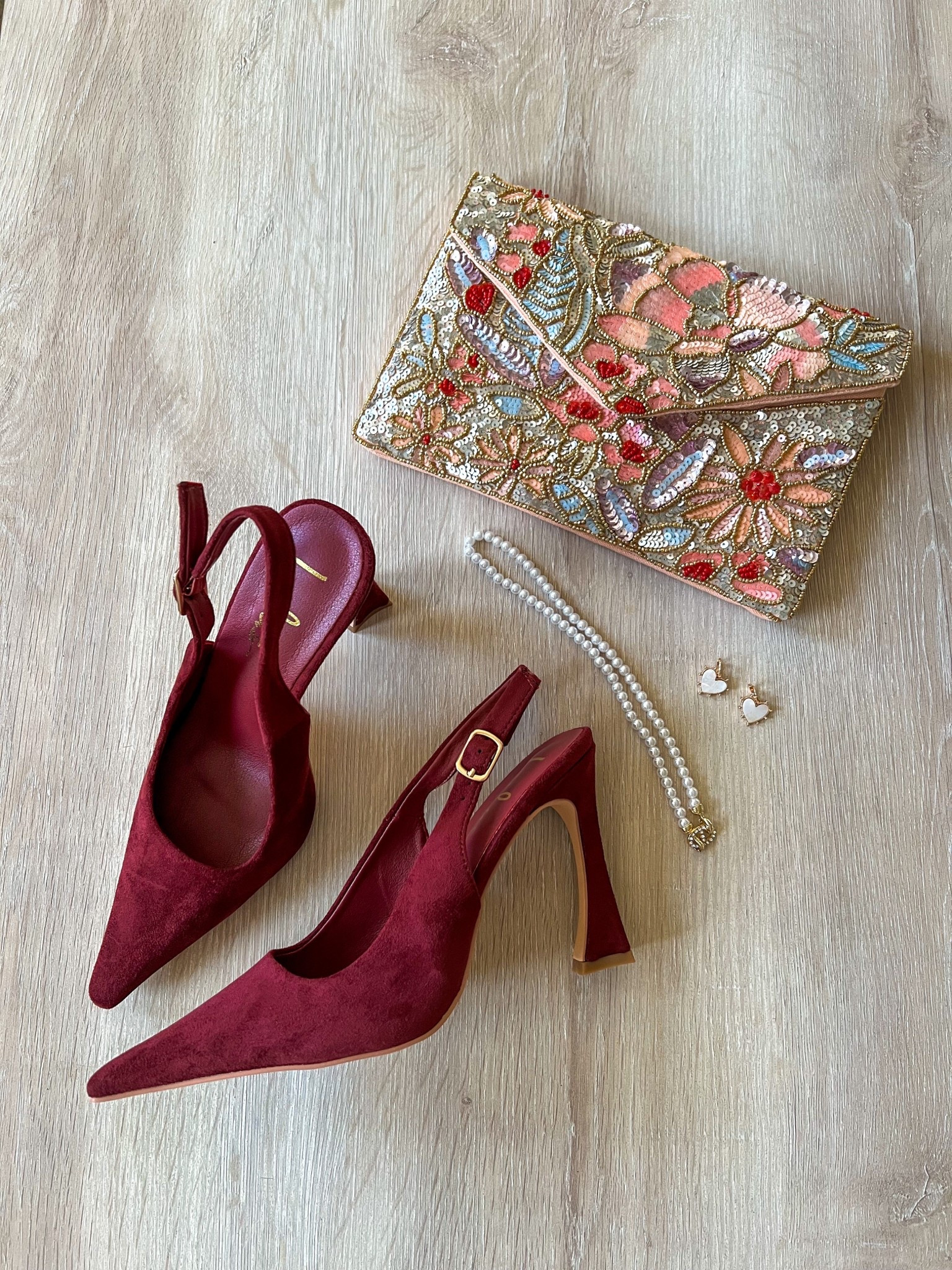 Finishing touches that speak volumes ✨ Burgundy slingbacks, embroidered clutch, and a hint of sparkle—linking my go-to glam accessories on LTK for your next soirée.  

#LTKValentine #LTKgrwm #LTKootd