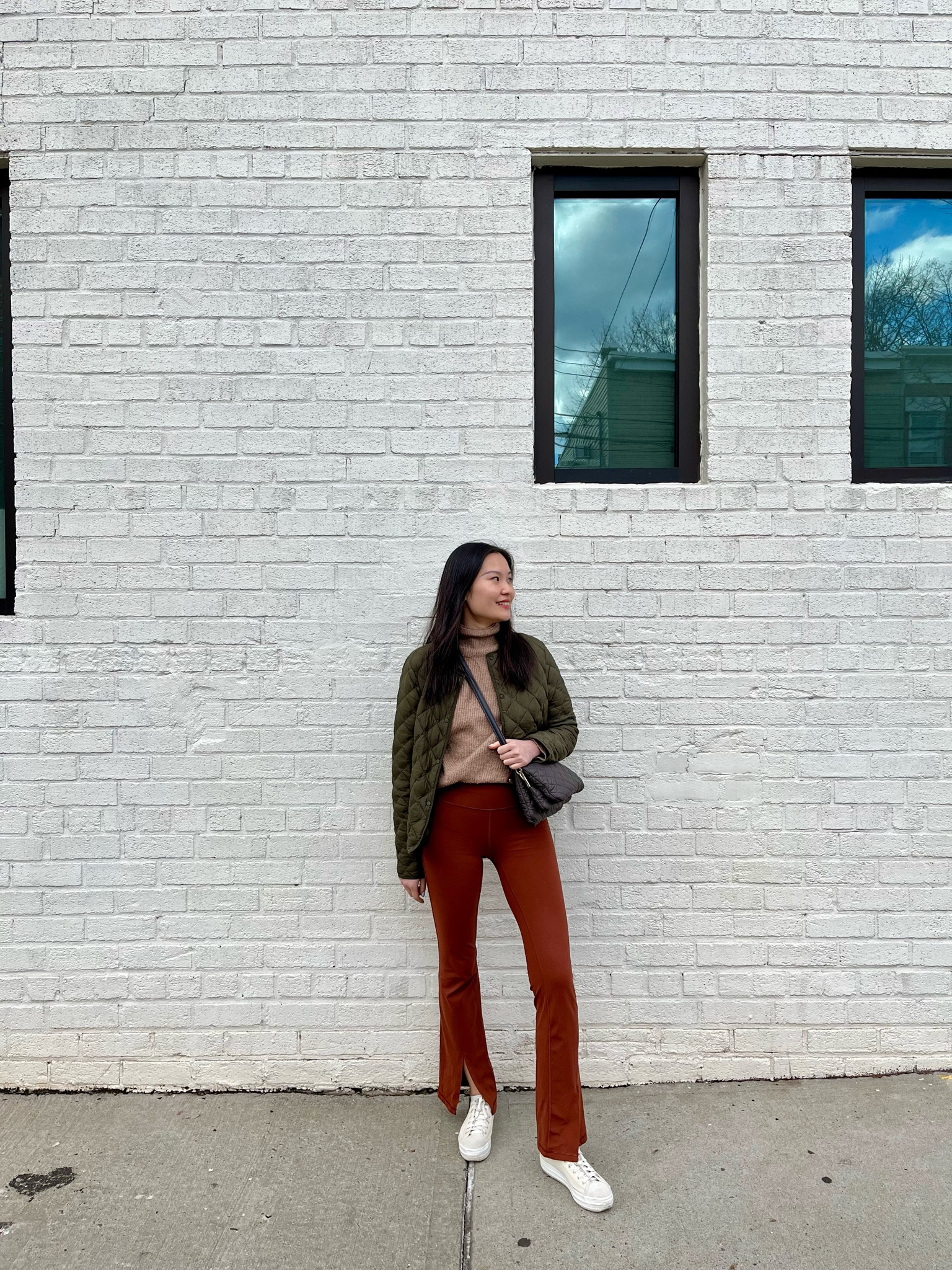 Casual Spring Outfit: My comfy Athleta split hem leggings are on sale for under $70 and still available in all sizes (wearing S - TTS). Olive Green quilted liner puffer jacket - S (great transitional outerwear layer). MZ Wallace Quilted Pippa Crossbody Handbag with adjustable leather strap - holds so much for its size, and comes with 3 different straps.

White Platform Sneakers - Keds TTS for me.  

#LTKstyletip #LTKtravel #LTKitbag