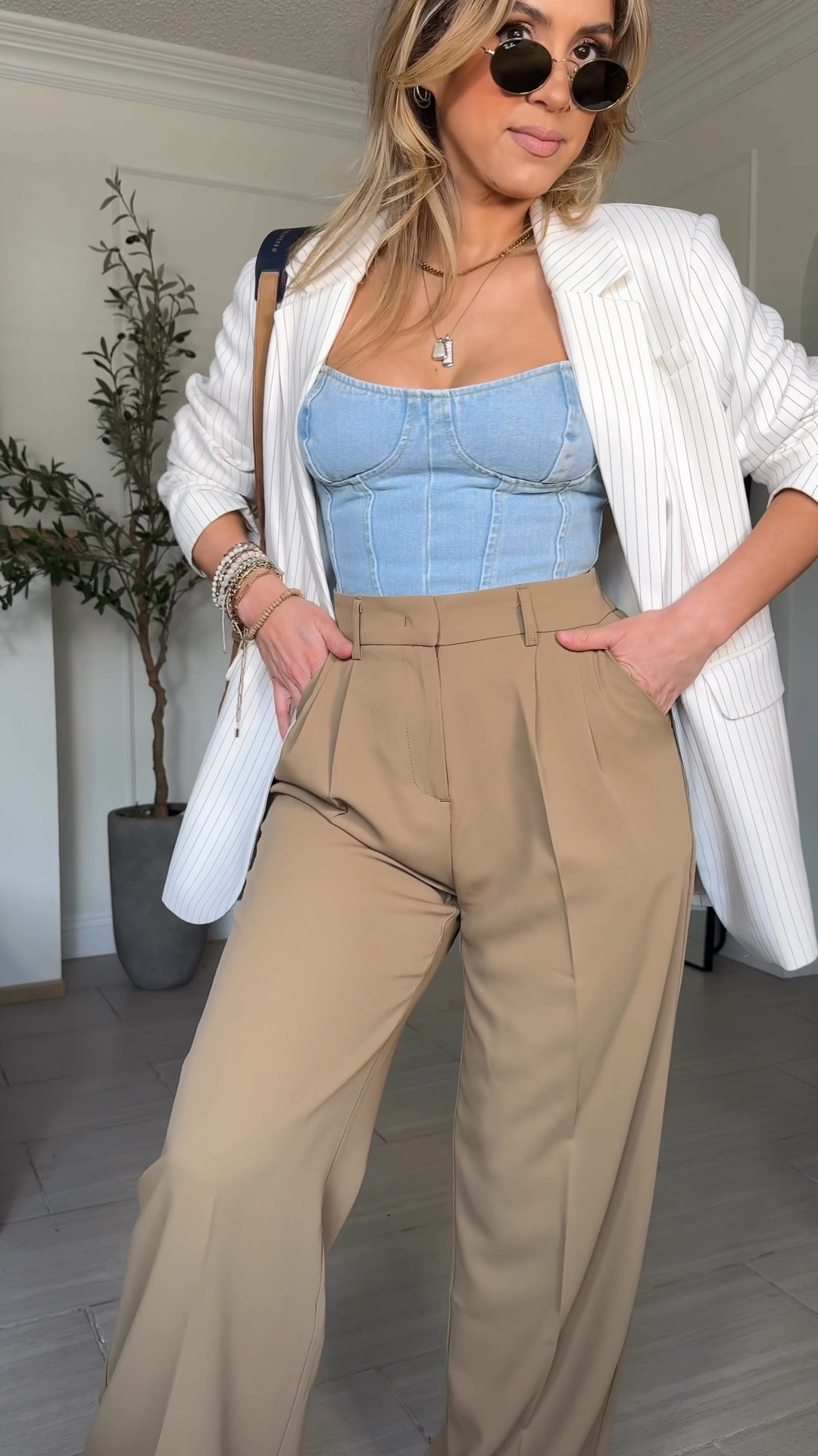Casual chic blazer outfit 😍

Blazers are one of my absolute favorite pieces to style. They are my comfort and I can wear them pretty much every day lol 

Blazer - medium in the color WHITE STRIPE
Trousers - SMALL LONG (I'm 5'3); they run short
Corset - size 4

It is so hard to find a light wash denim corset like this that are actually cute. The one I’m wearing does not have a lot of stretch girls. I’m so sorry. However, I did find one on Amazon. That’s a little darker wash, still very cute, and it does have some stretch. Linked below! 

#LTKSpringSale #LTKU #LTKsalealert