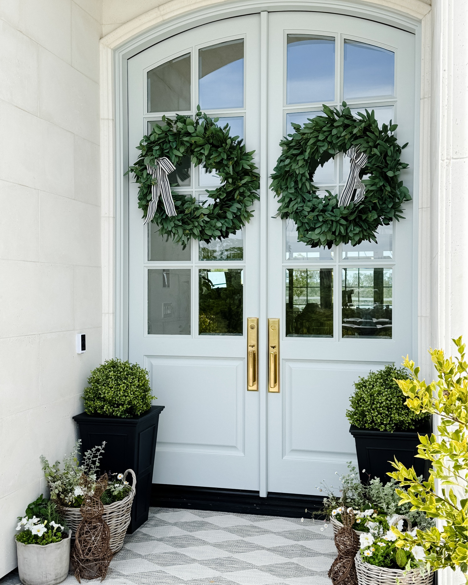 Spring front porch from last year!  Wreaths, my favorite rug, planters I love and my favorite faux boxwoods!

#LTKHome #LTKSaleAlert #LTKSpringSale