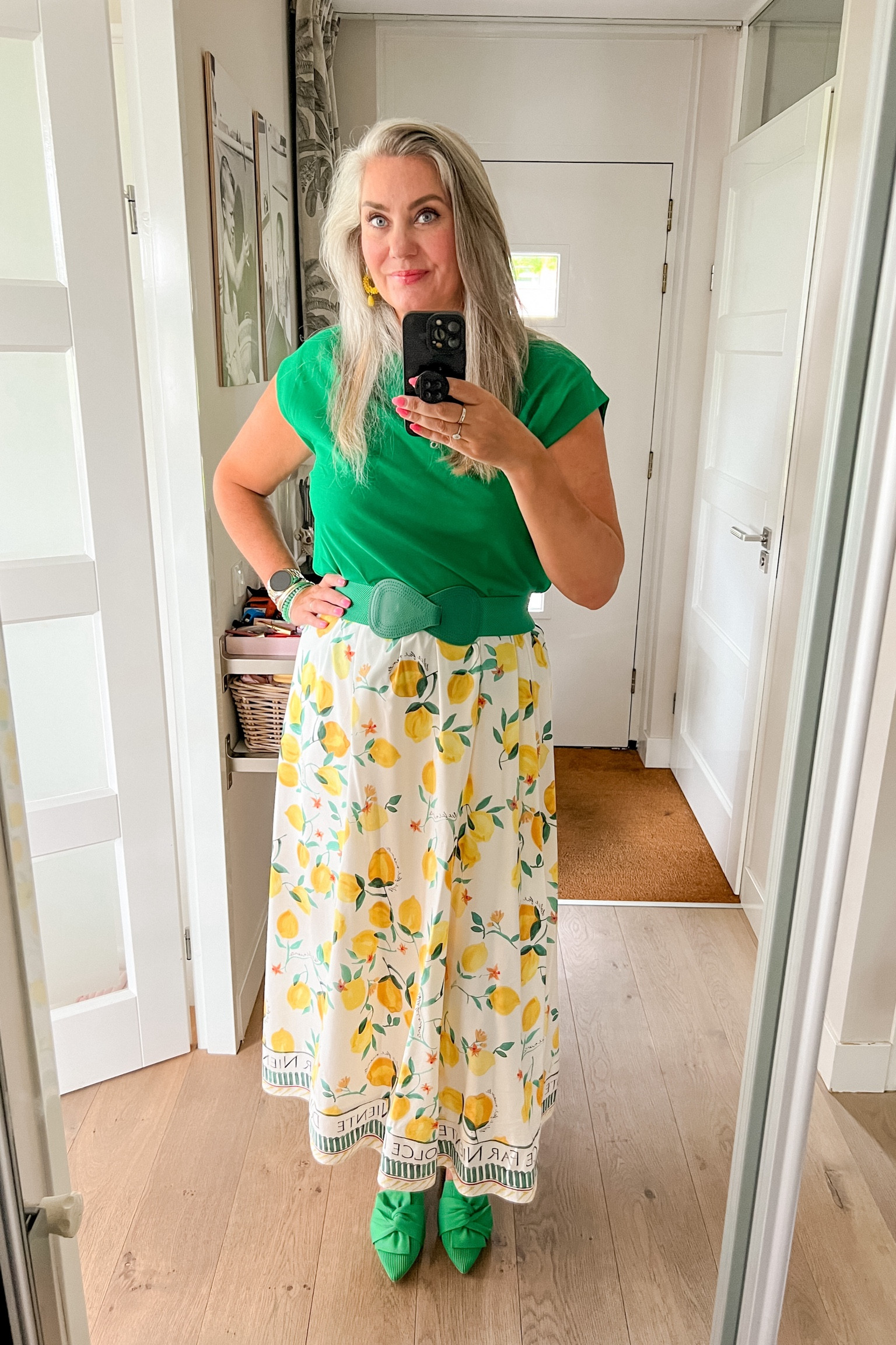 Ootd - Sunday. Green t-shirt (HEMA) paired with a lemon print midi skirt, a green elastic belt and green slide on loafers from Vivaia. 

#LTKsummer #LTKeurope #LTKnederlands