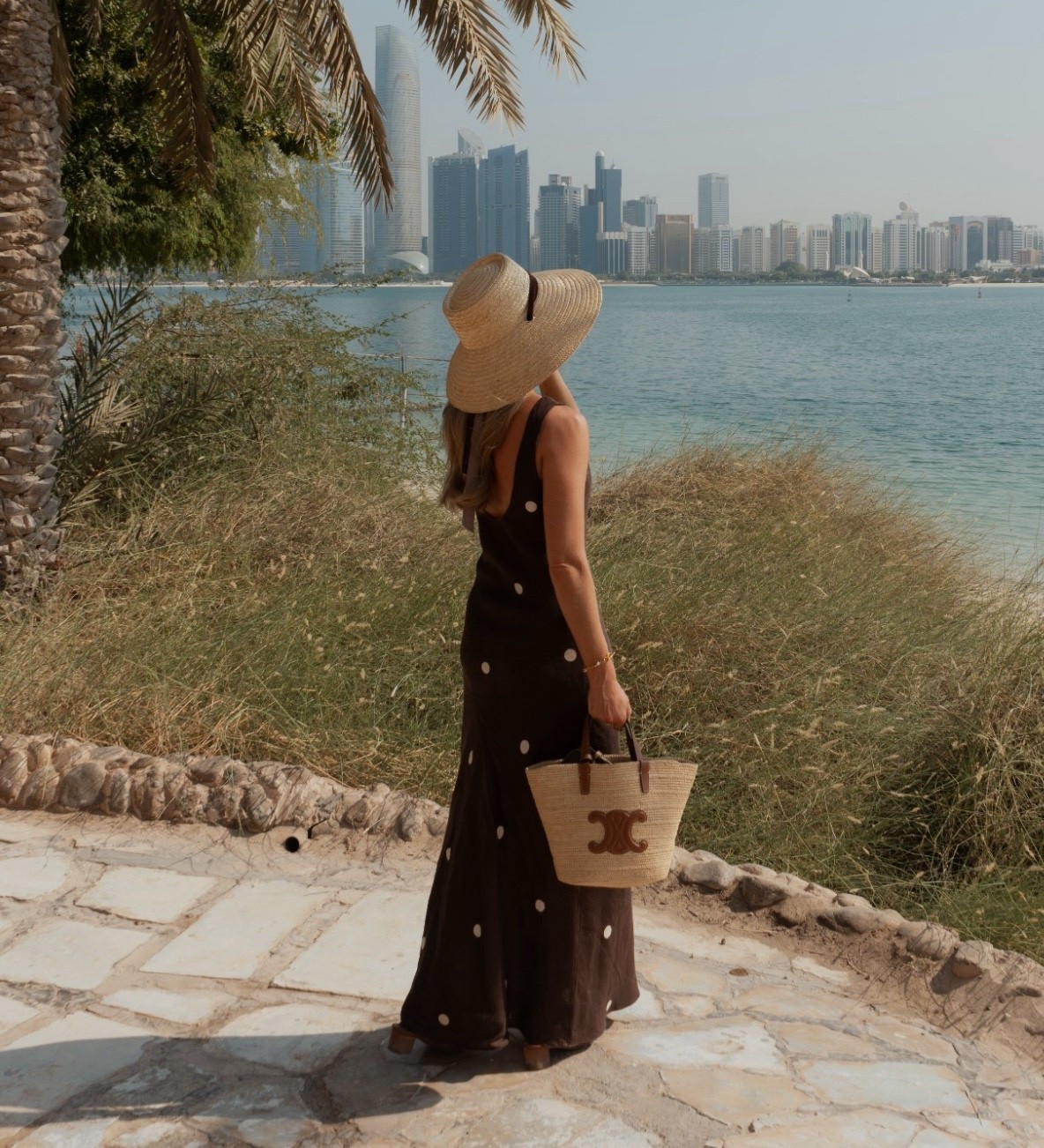 My winter sun holiday outfit 🤍 Polka dot dress, chocolate brown dress from Dissh! Luxury bag from Celine 🫶🏼 Holiday outfits! 

#LTKuk #LTKdresses #LTKluxury