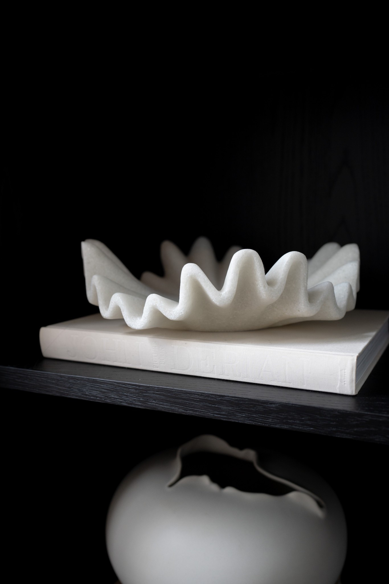 Look at this bowl (and the vase and the book)! These pieces add movement and drama to any space.

#LTKHome #LTKSeasonal #LTKStyleTip