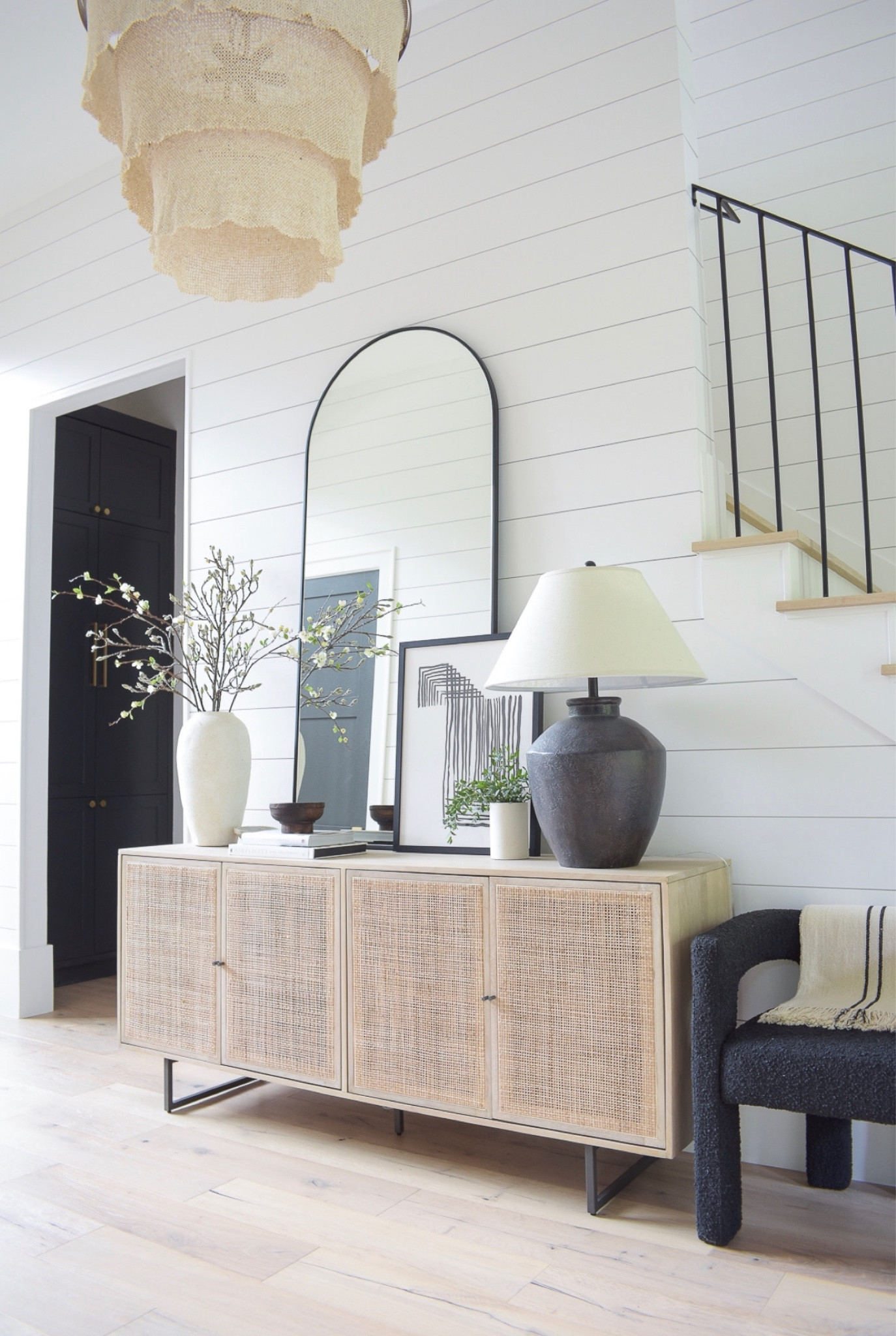 My credenza, buffet is on sale @ 20% off!  Entryway, entryway decor, home decor, foyer table, entryway table, arched mirror, black lamp, cb2, luluandgeorgia, mcgeeandco, boucle dining chair, spring fliers, faux flowers, spring blooms 

#LTKsalealert #LTKhome #LTKFind