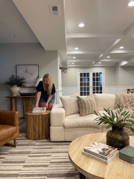 Basement styling inspo! Our basement is filled with warm brown tones and neutrals to contrast the dark cabinets and floors. #basement 

#LTKhome #LTKsalealert #LTKstyletip