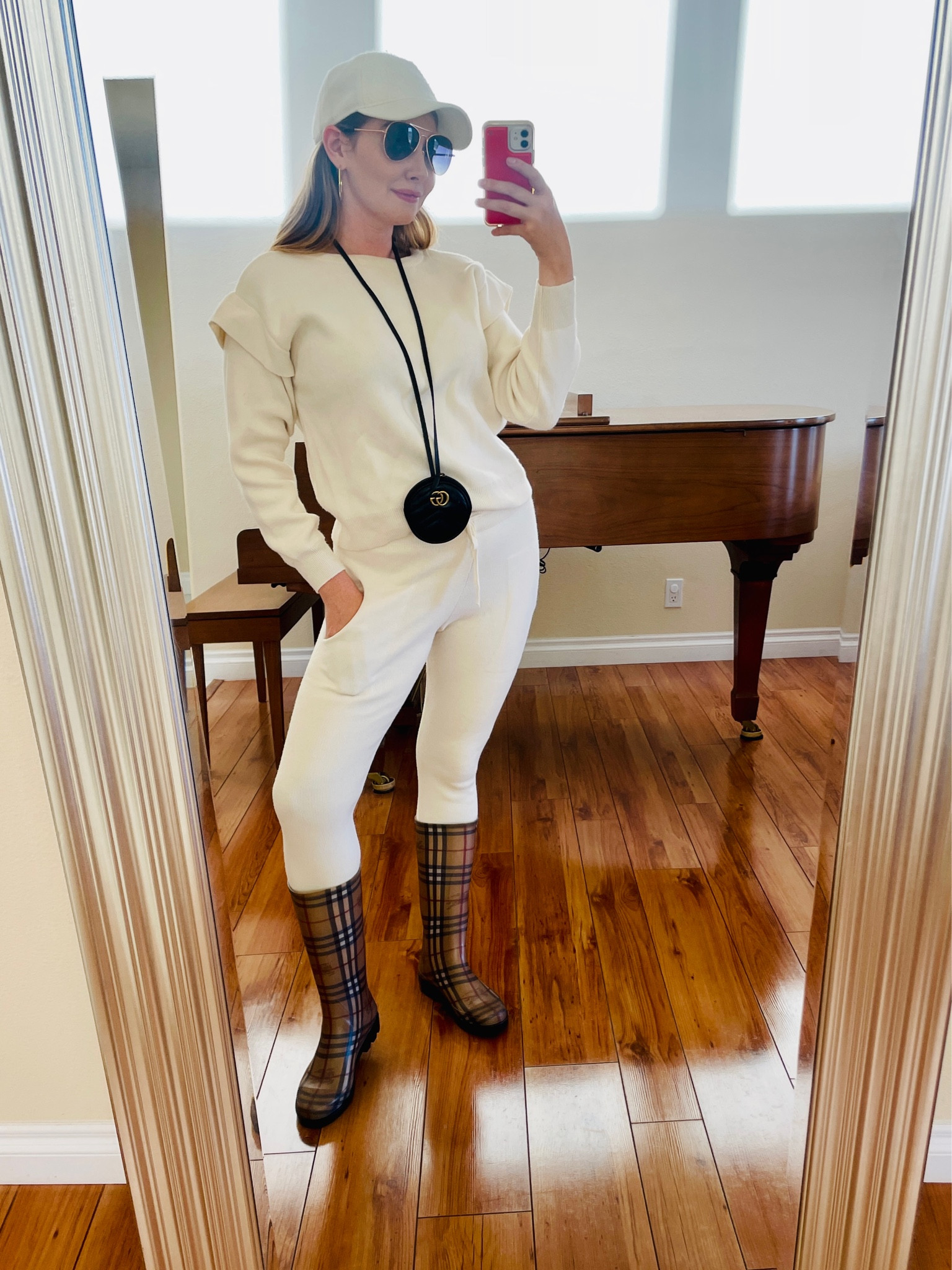 Rainy day loungewear set outfit! Set is old from Glamify Fashion but linked a cute $50 one from ASOS. I wear mine with my Burberry boots when it’s raining! So cozy! Sunnies are an amazing $13 find on Amazon. Linked a similar Gucci bag and teddy hat! 

#LTKfit #LTKstyletip #LTKSeasonal