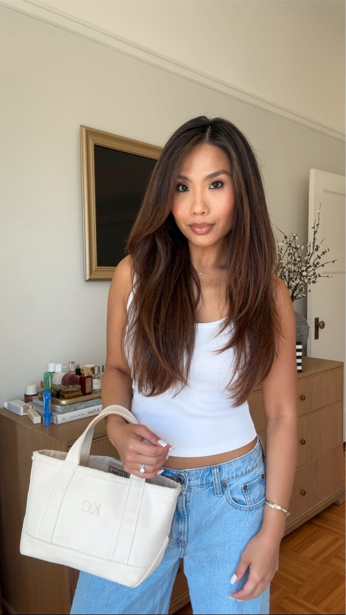 Casual outfit of the day! $16 Amazon tank and my go to low rise jeans 

Sizing:
Tank - tts, xs
Jeans - tts, 25 short in light wash with raw hem
Boat and tote - mini size, natural on natural lettering

Also linked everything I used to blow dry my hair and style!

#LTKselfcare #LTKootd #LTKBeauty