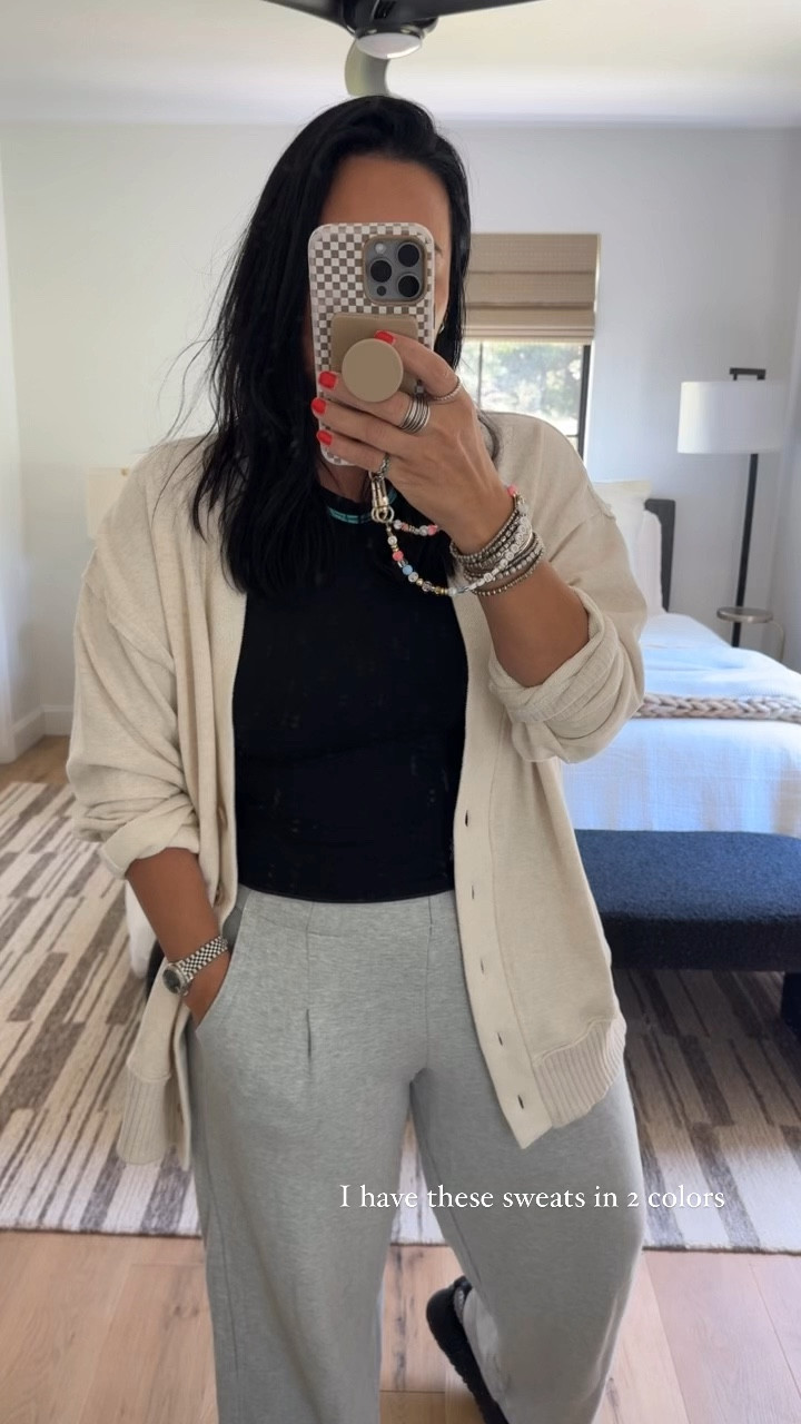 My sweater cardigan is on sale for $25 (that’s 62% off)! I’m wearing a size medium in the cardigan , sweats size medium (size down if between sizes), and shoes fit tts  

#LTKMidsize #LTKTravel #LTKSaleAlert