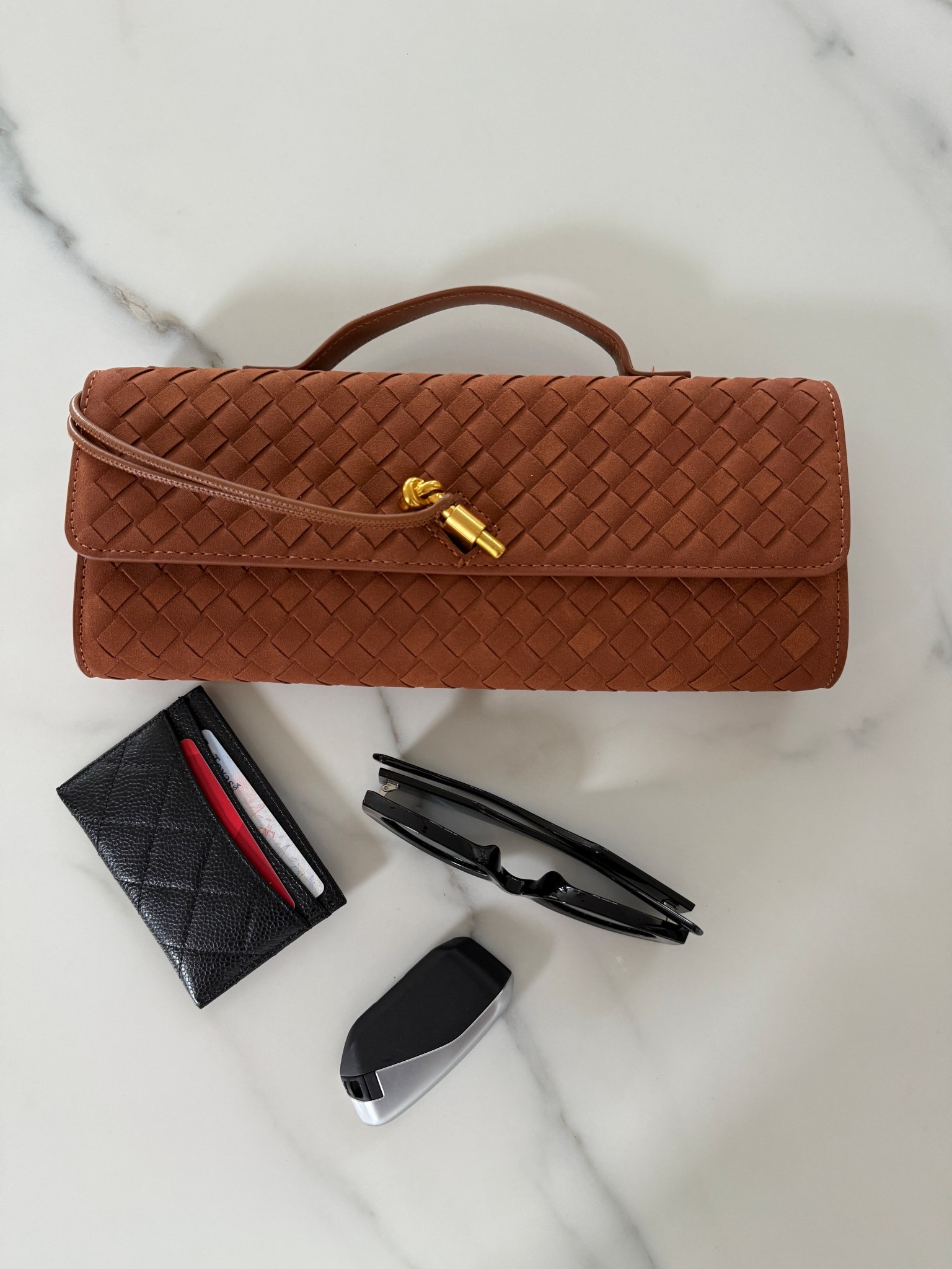 Designer look for less ✨ This Bottega-inspired clutch gives all the luxe vibes without the splurge. The woven texture and chic silhouette make it the perfect statement piece to dress up any outfit. Linking this affordable lookalike so you can get the high-end style at a fraction of the price. 

#LTKFindsUnder100 #LTKItBag #LTKSeasonal