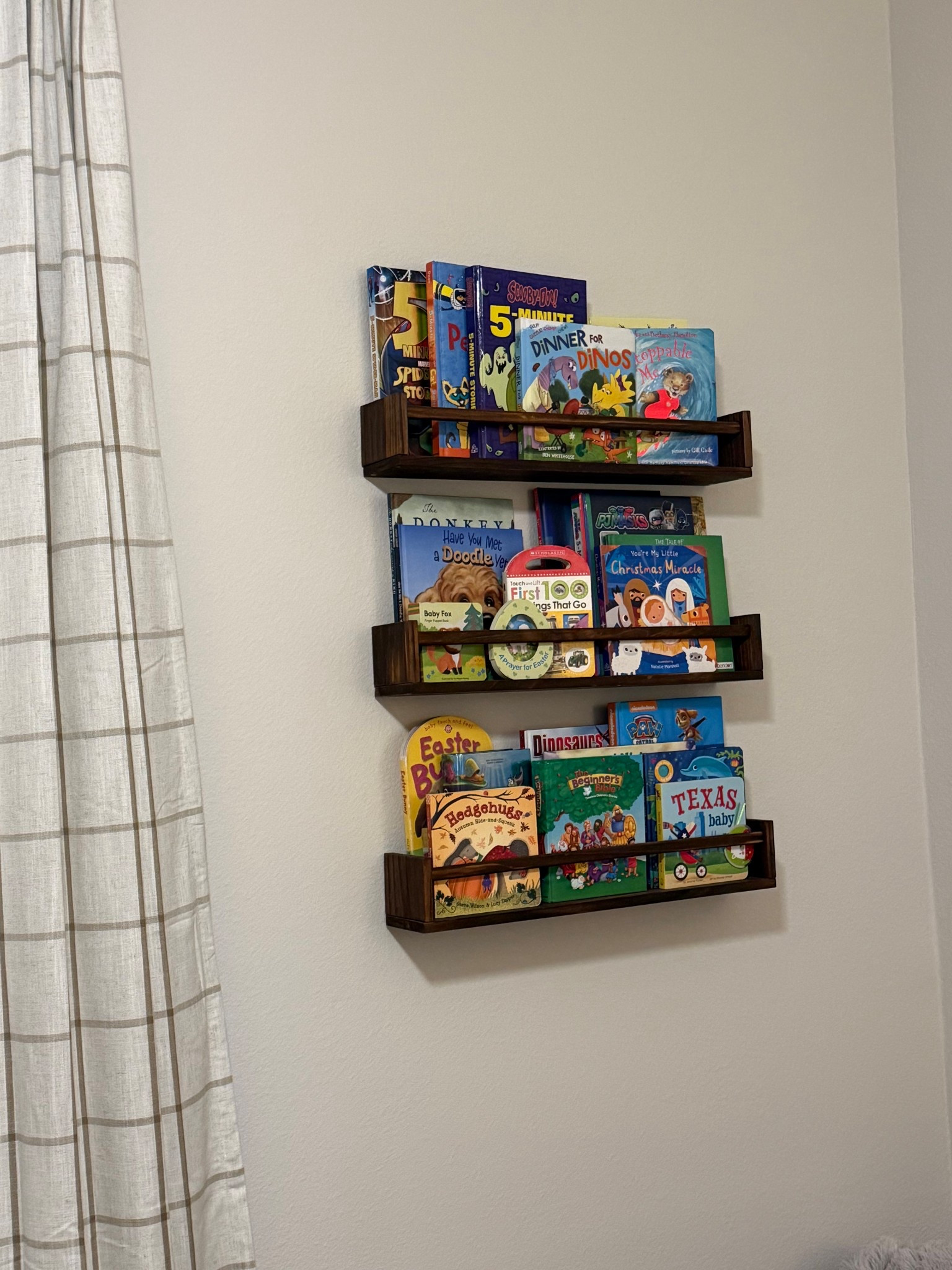 Plaid blackout curtains and the best little walnut wall shelves. Perfect for a nursery!

#LTKHome #LTKBaby
