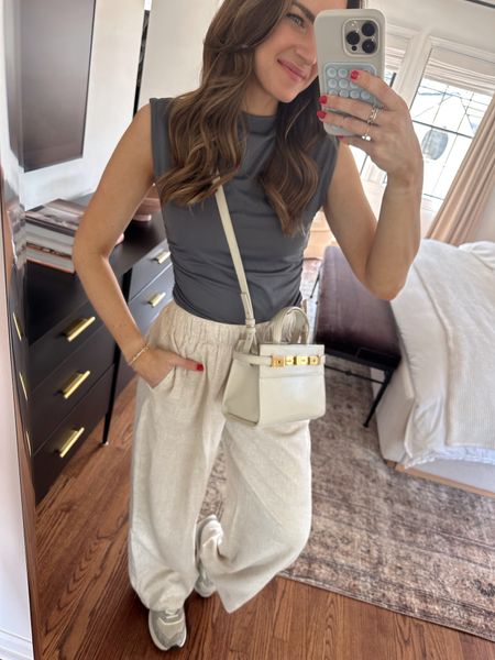 Casual spring 'fit. This ruched top is so good! It comes several colors & is a great basic for spring/summer. I'm wearing a size S in the top & pants. Sneakers fit TTS! 