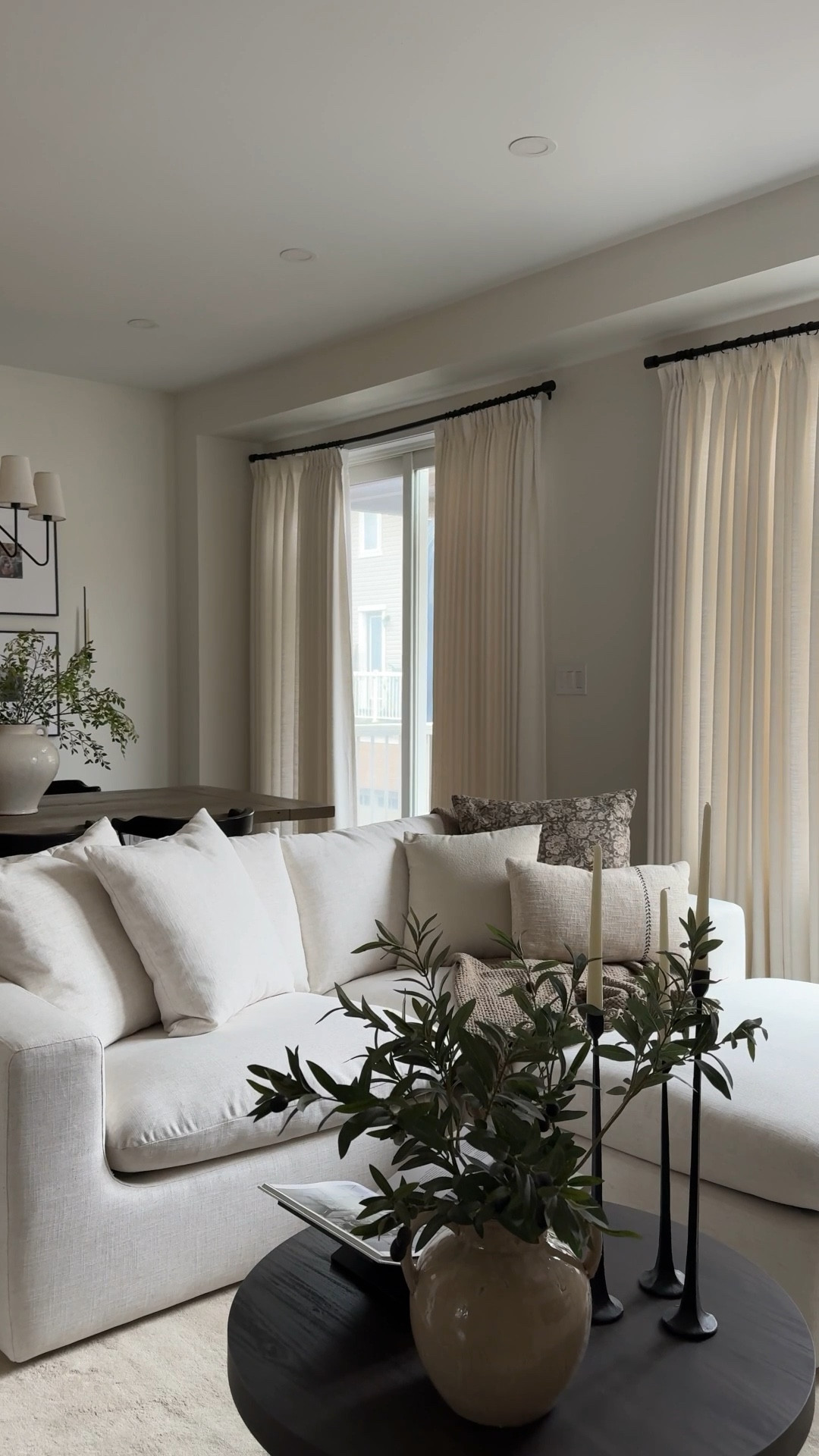 Our living room transformation continues.. lighter, brighter and larger - our new Dawson sofa with the matching ottoman from @castleryca is the perfect match for our growing family. More room for movie night cuddles with a cloud-like design that can easily be reconfigured to meet our small-space needs. It pairs perfectly with the Cora wool area rug and the bright neutral colour scheme makes the space feel much larger despite expanding the size of our seating. 

The best part? We’ve experienced the performance fabric holding up against pet & toddler stains already and the easy to remove covers pass the family approved test. 

Castlery is now available in Canada & makes refreshing a space easy with their wide variety of home furnishings. This cozy space is officially ready to make new memories as a family of four! 

#AtHomeWithCastlery #homedecorideas #homedecortips #homemakeover