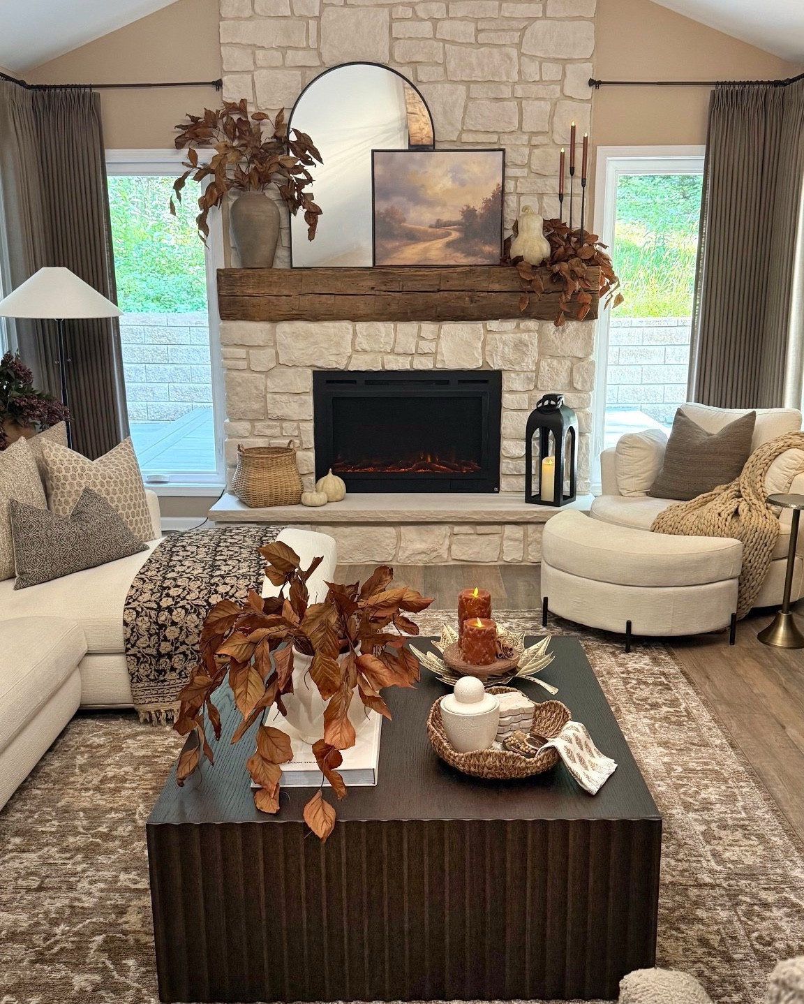 Fall Living Room Styling with Warm Neutrals & Layered Texture

Follow @farmtotablecreations on Instagram for more cozy home inspiration.

This space is giving major early fall vibes 🤎 I styled the mantle with a 22x26 framed artwork—use code FARMTOTABLE for 15% off—and layered in sculptural stems, warm candles, and neutral fall accents to bring in those cozy, collected tones. The Casablanca Rough Cut stone fireplace creates the perfect rustic focal point, while the fluted coffee table, cozy swivel chair, and burnt rust stems tie the whole look together. Every piece adds to the feeling of warmth and intention—perfect for ushering in the season.

Tap to shop the exact finds featured here!

#falllivingroom #mantlestyling #livingroomstyling #stonefireplace #flutedtable #swivelchair #fallstems #fallpillows #coffeetablestyling #neutraldecor #fallhome #LTKHome #LTKSeasonal #LTKDecor #LTKFall #cozycorner #livingroomgoals

#LTKFindsUnder50 #LTKSaleAlert #LTKHome