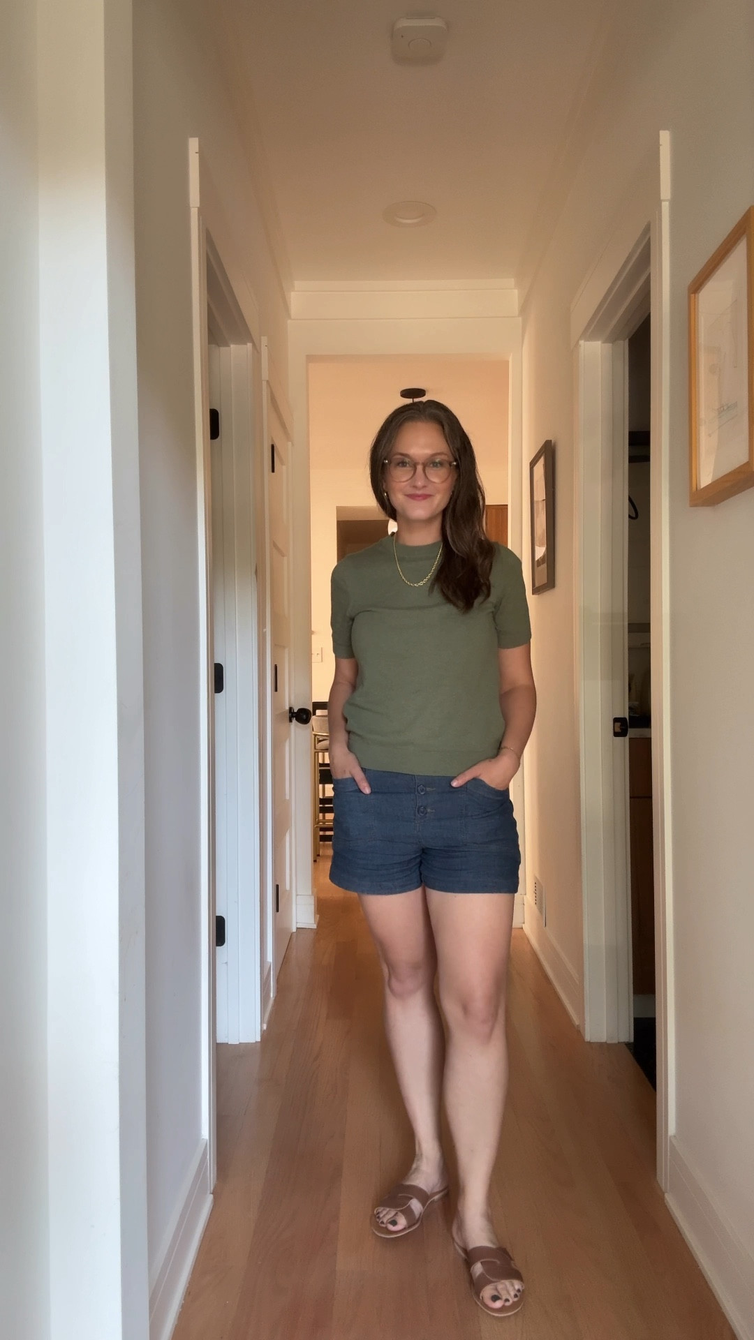 It’s a sunny Monday in August, and the city mom is keeping it casual yet chic in a short-sleeve green sweater paired with blue linen shorts, the perfect combination of cozy and cool for a day in Chicago. Her brown sandals ground the outfit with laid-back style, while her go-to gold hoops and graduated rope necklace add a touch of elegance to the relaxed vibe. Her new stack of permanent bracelets sparkles with every movement, a small reminder of the simple joys. Today’s a big day—she’s dropped her son off for his first week of full-time daycare, and while she had grand plans to tackle her to-do list with all this newfound free time, somehow it feels like the list is growing faster than she can cross things off. She spent the day writing blog posts, completing author interviews, and planning for a new venture that she’ll be sharing on Instagram tomorrow\... so stay tuned! From the chaos of the day to the thrill of new projects, she’s tackling it all in style.

#LTKWorkwear #LTKShoeCrush #LTKSeasonal