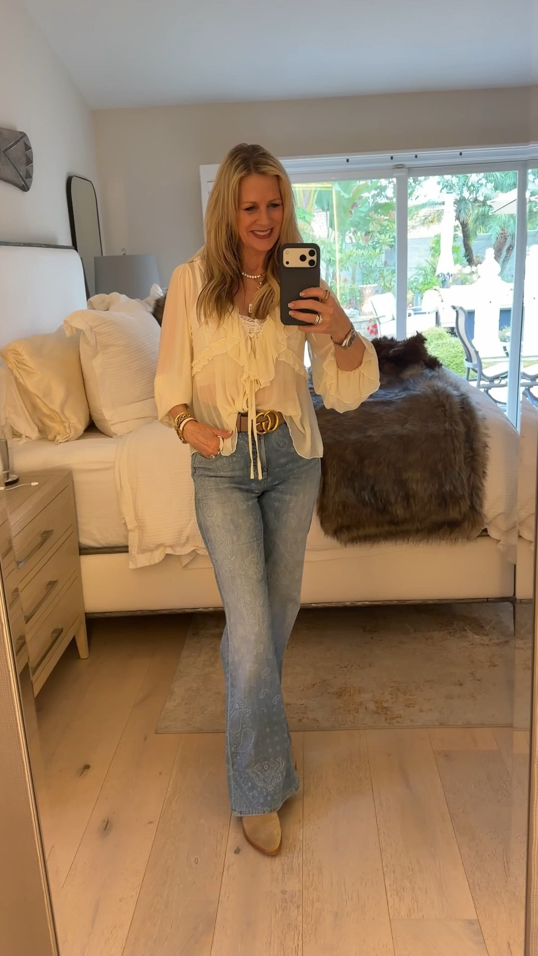 This fun Free People sheer top and layered necklaces is giving total boho vibes. 

#LTKOver40 #LTKootd