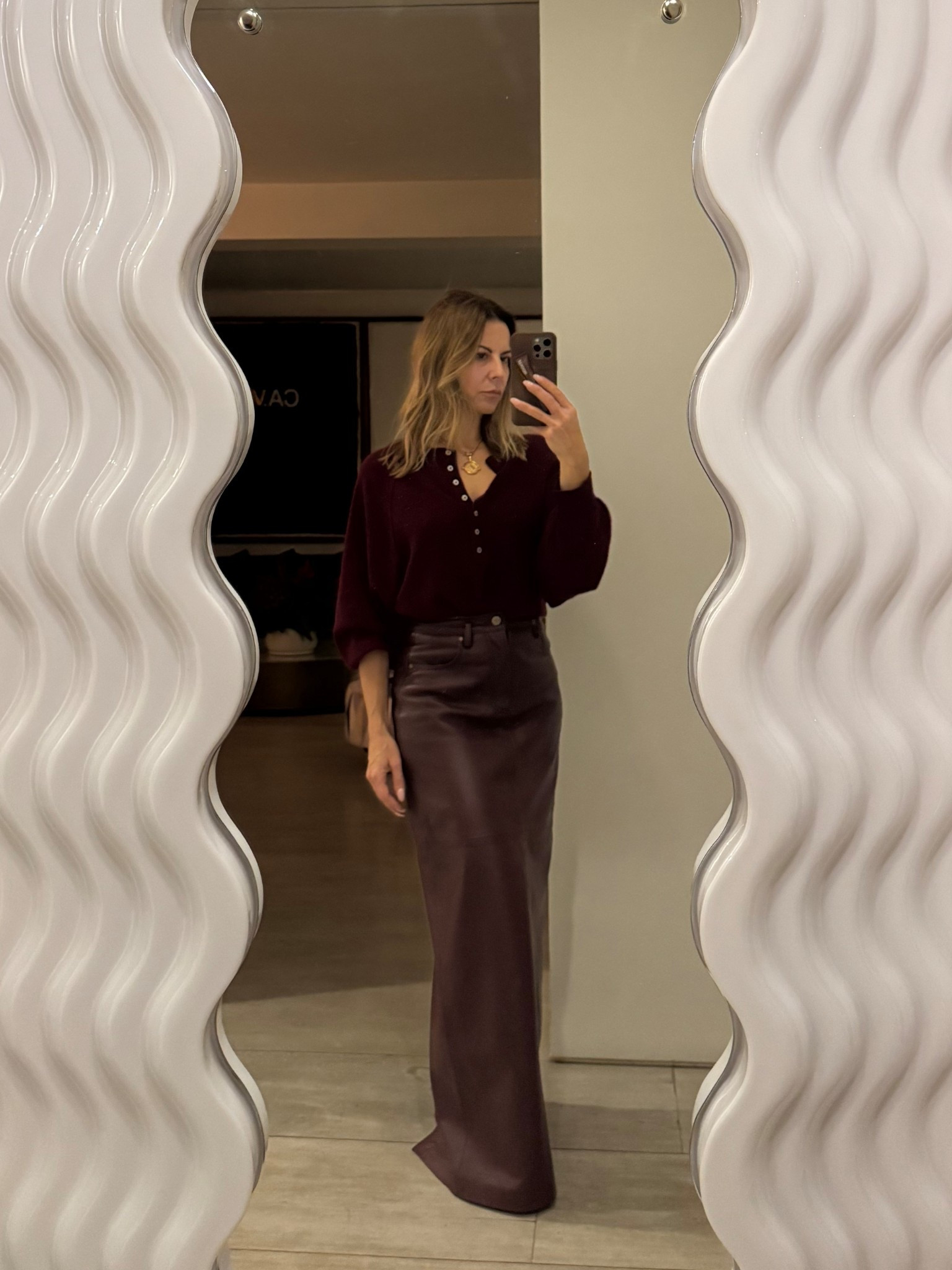 Sweater comes in 17 colors , wearing the burgundy in XS the color is called Endless Passion on the website. Great quality, boxy fit and runs big. 
Skirt in XS