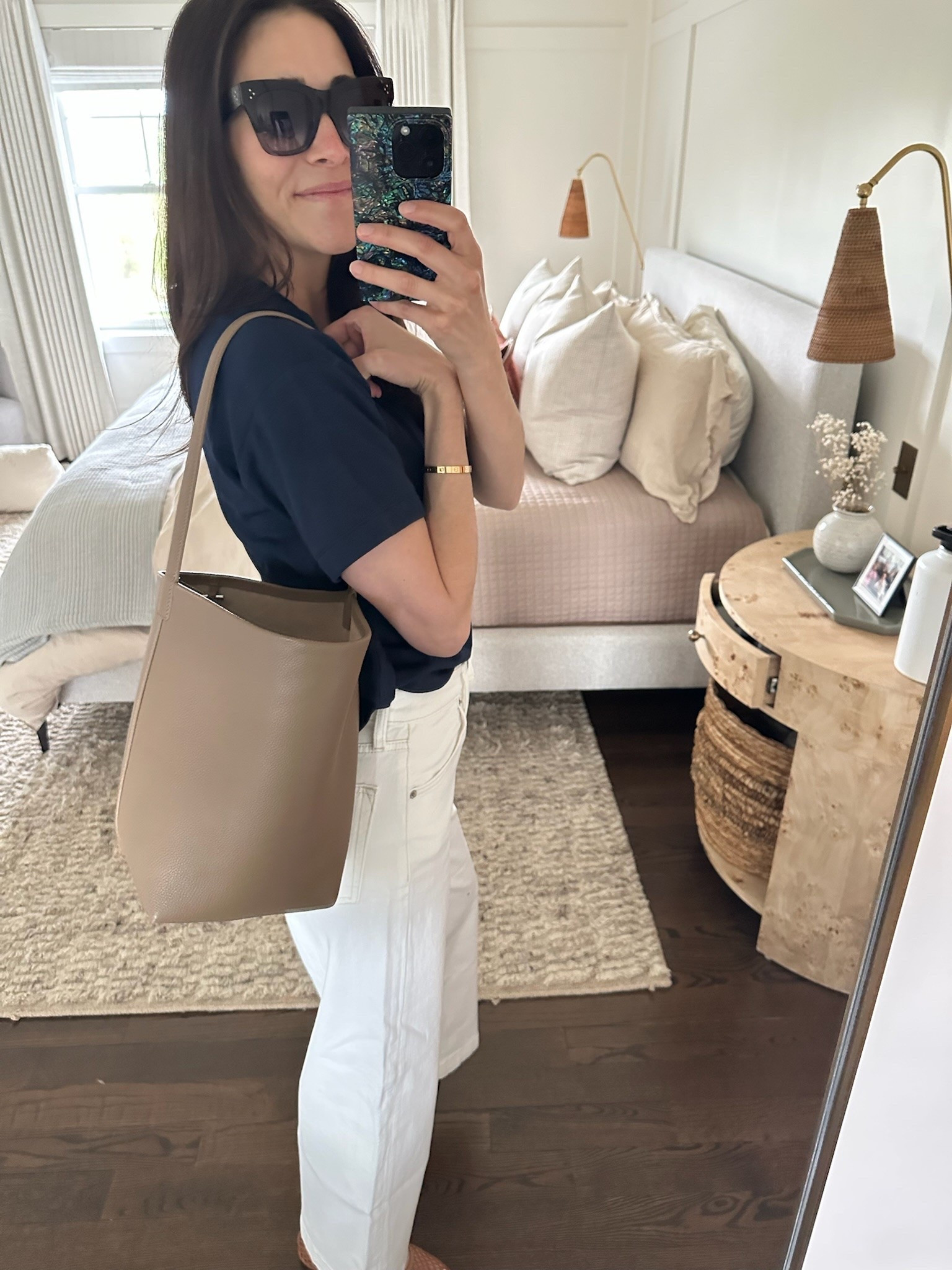this bag is SO good [an incredible dupe for the row tote]. real leather + under $150! just bought it in the ivory too, it’s THAT good

this is the warm taupe in size small

*yes, the open drawer is driving me CRAZY too

handbag // gifts for mom // summer style // style inspiration

#LTKMothersDay #LTKootd #LTKmomlife