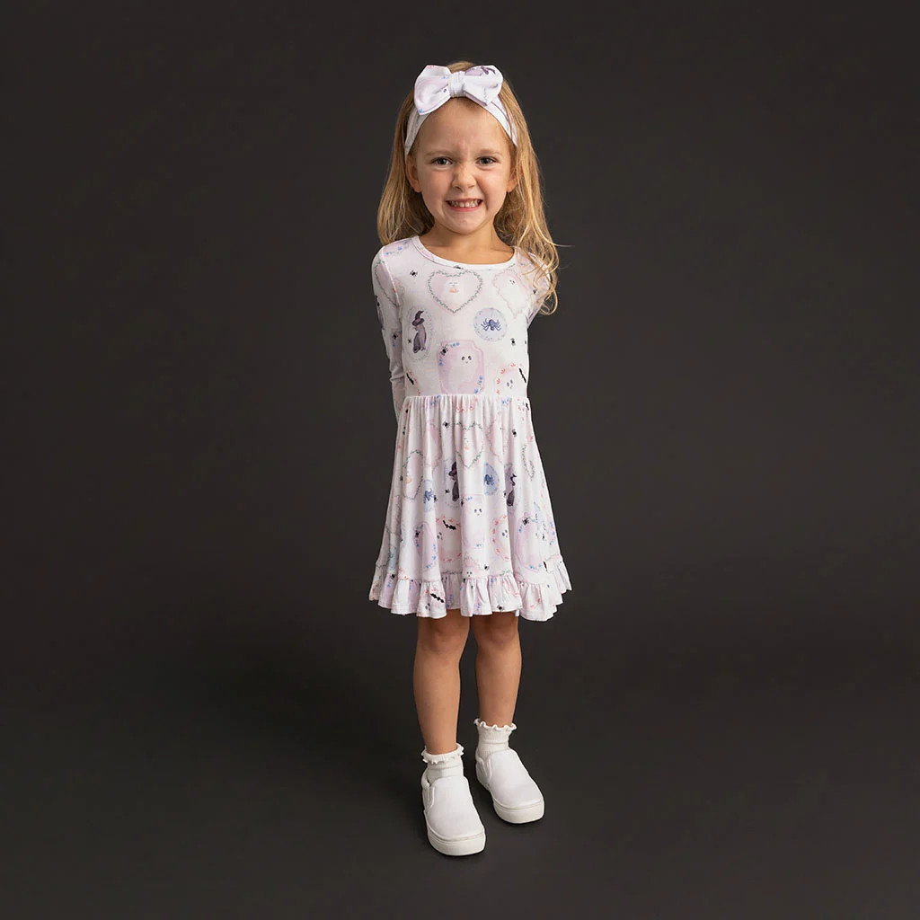 Halloween White Long Sleeve Posh Spooks Ruffled Twirl Dress | Posh Peanut® | Posh Peanut