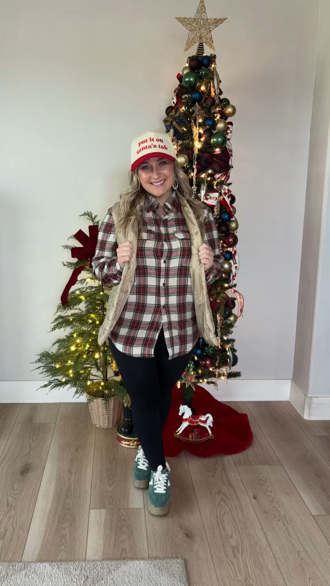 Day 22 of 25 Days of Christensen Christmas 🎄❤️

Today’s look is classic Christmas casual with a playful twist. A cozy plaid button-down layered under a neutral puffer vest makes this outfit perfect for running holiday errands, grabbing coffee, or heading out to see Christmas lights. The festive trucker hat adds a little humor and personality—because let’s be honest, December runs on coffee, vibes, and Santa’s tab 😉

Finished it off with leggings and comfy sneakers for an easy, laid-back holiday look that still feels festive and put together. Proof that Christmas style doesn’t have to be fancy to be fun.

#25DaysofChristensenChristmas #Day22 #PlaidForTheHolidays #ChristmasCasual #FestiveStyle #HolidayOOTD #ChristensenChristmas 🎅✨

#LTKgrwm #LTKHoliday #LTKootd