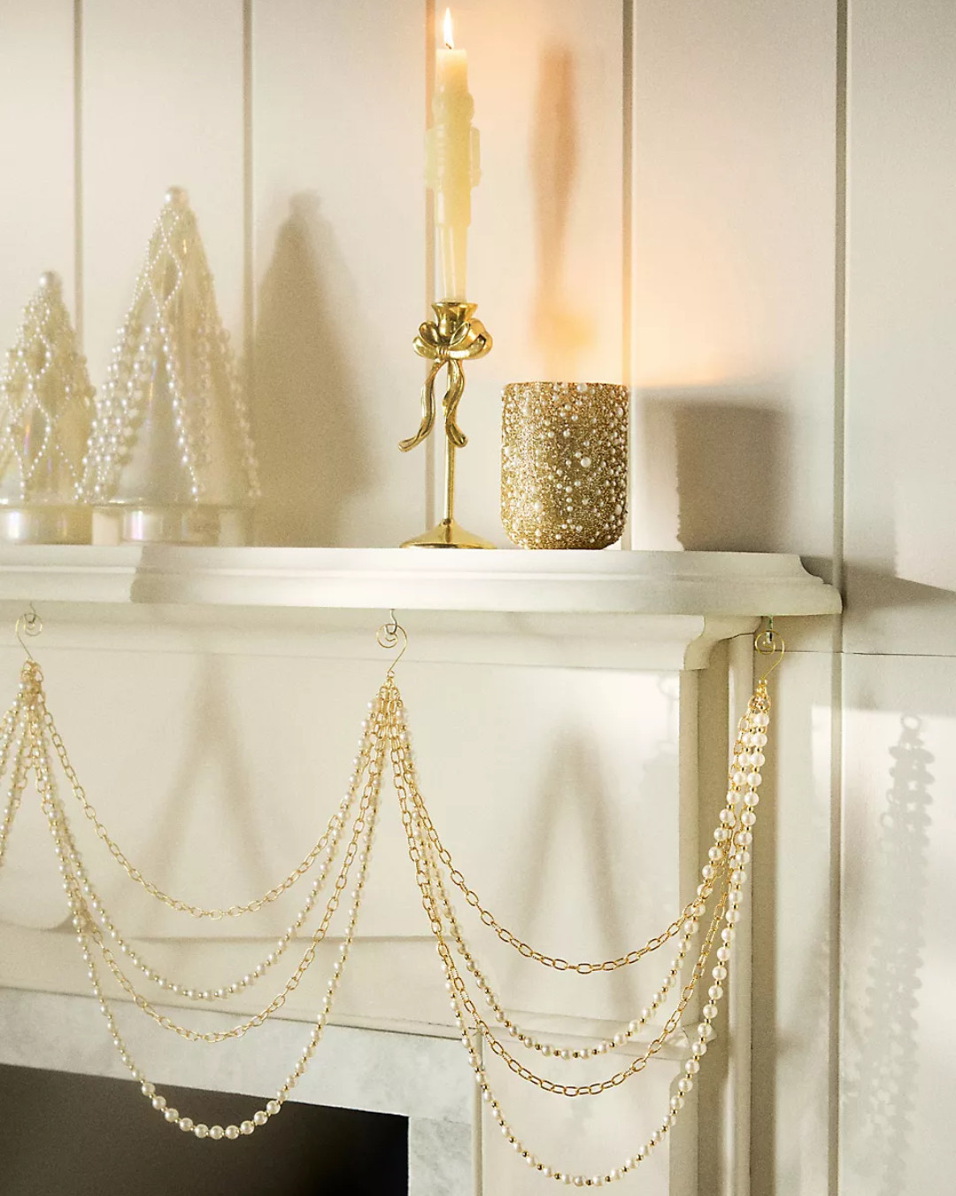Pearl Swoop Garland
#mantledecor#christmasdecor
#anthropologie#elegantchristmas 

 #LTKSeasonal #LTKHome #LTKFindsUnder100