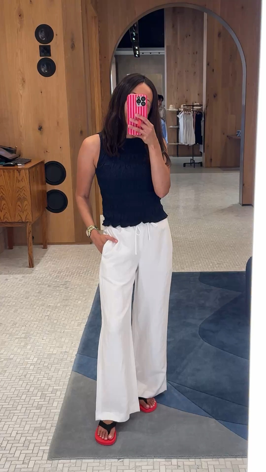 White pants. Linen pants. Summer pants outfit. Dressy casual outfit. Elevated casual outfit. Vacation outfit. 
Tank top with a gathered texture that is stretchy. All cotton. I sized up. Also available in pink and white (navy pictured here). Wide leg linen blend pants. Great cut and fit. True to size. 
Red flip flops.

#LTKootd #LTKOver40