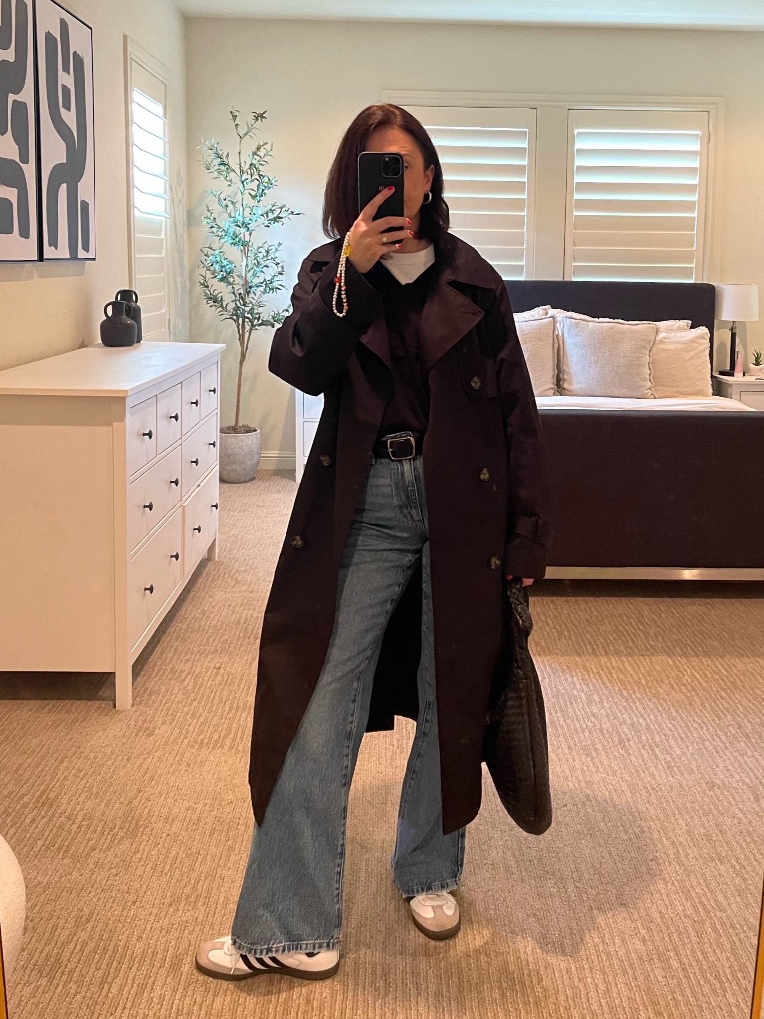 Classic winter outfit 
Build from your base 
White tee, garage jeans, belt, black v neck , black trench coat, samba sneakers and anthropology knot bag ❤️

#LTKitbag #LTKSeasonal #LTKstyletip