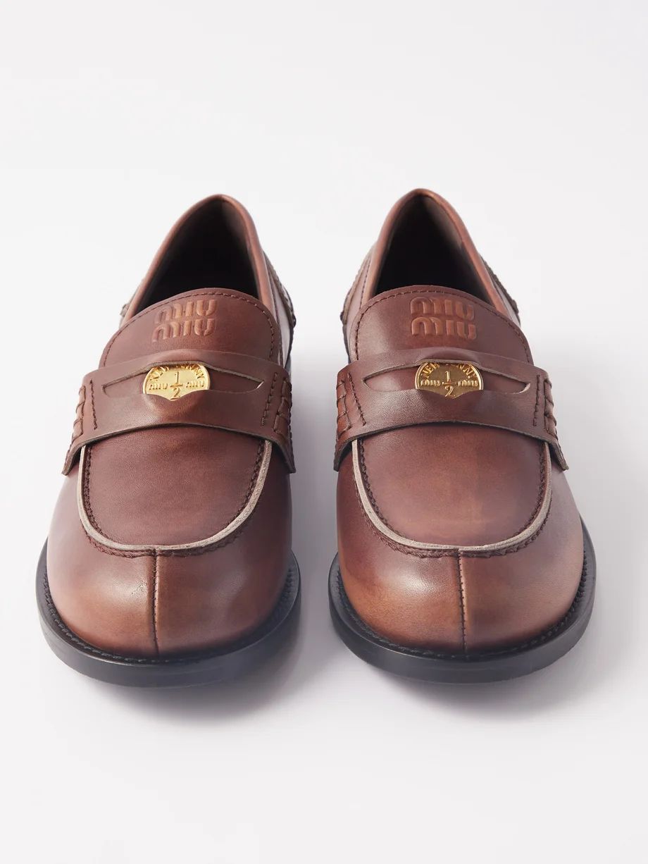 Logo-coin raw-edge leather loafers | Miu Miu | Matches (US)