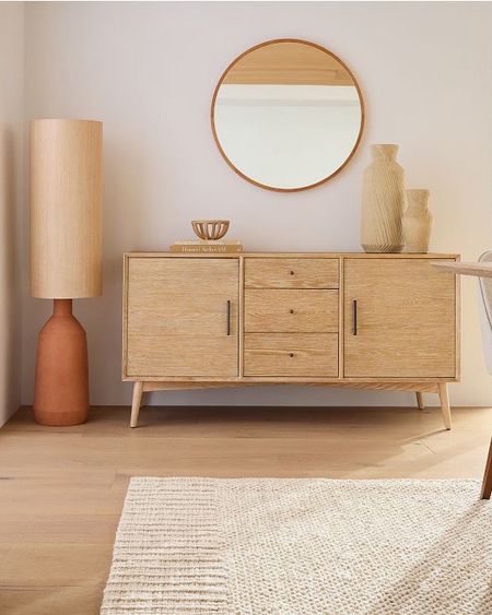 Major markdown alert—-check out this mid-century inspired multi-purpose sideboard. We love the light wood finish, the simple yet elegant silhouette, the drawers and shelves for storage and organizing solutions. It will elevate your dining or living spaces. The materials are sustainably sourced. #sideboard

#LTKSaleAlert #LTKHome