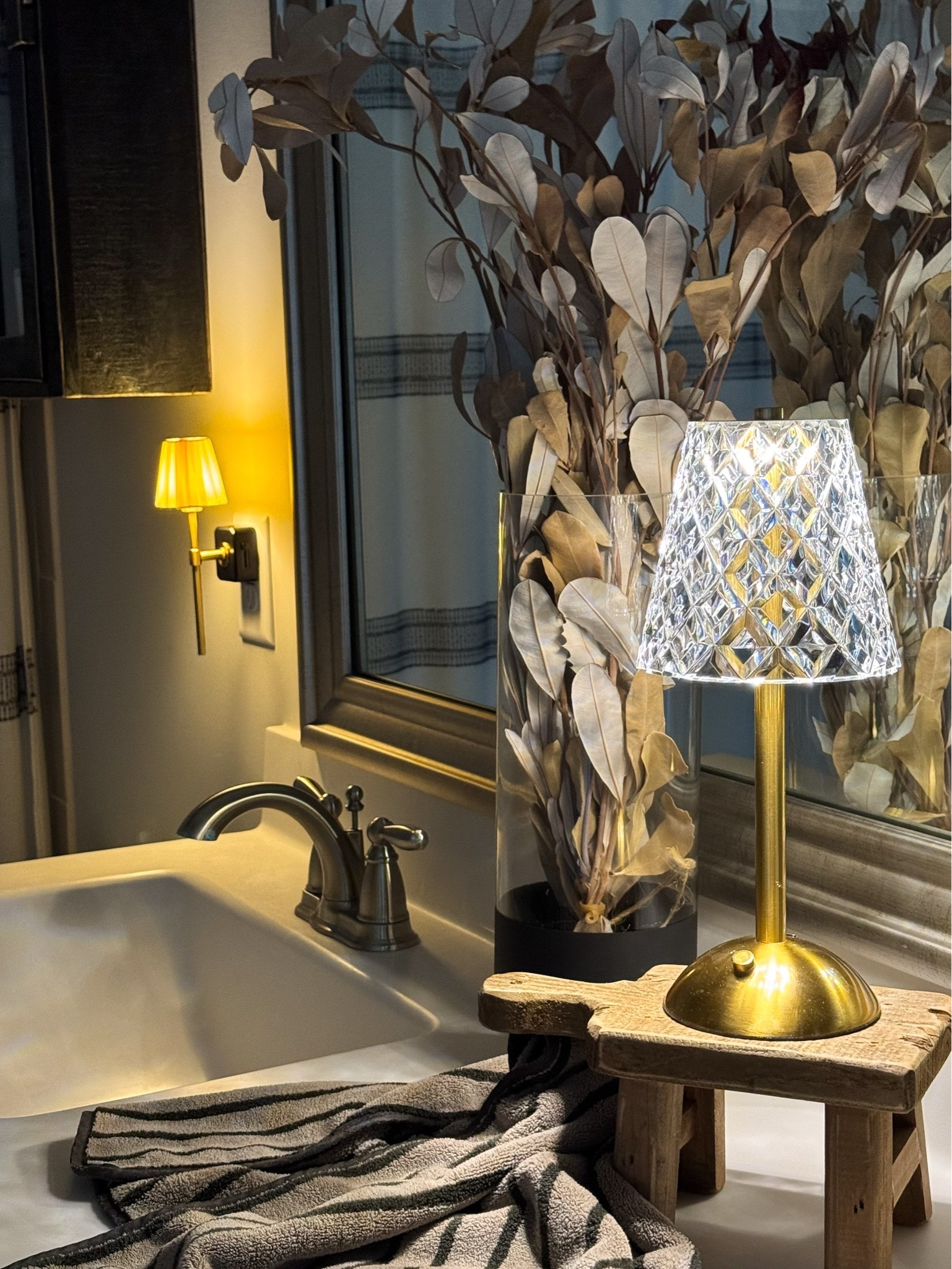 This adorable nightlight still makes me smile every time I walk in to my guest bath. The vintage inspired sconce design is so fun.

Nightlight, rechargeable crystal light, wood pedestal, stems, black medicine cabinet, striped bath towels

#LTKstorytime #LTKSeasonal #LTKHome