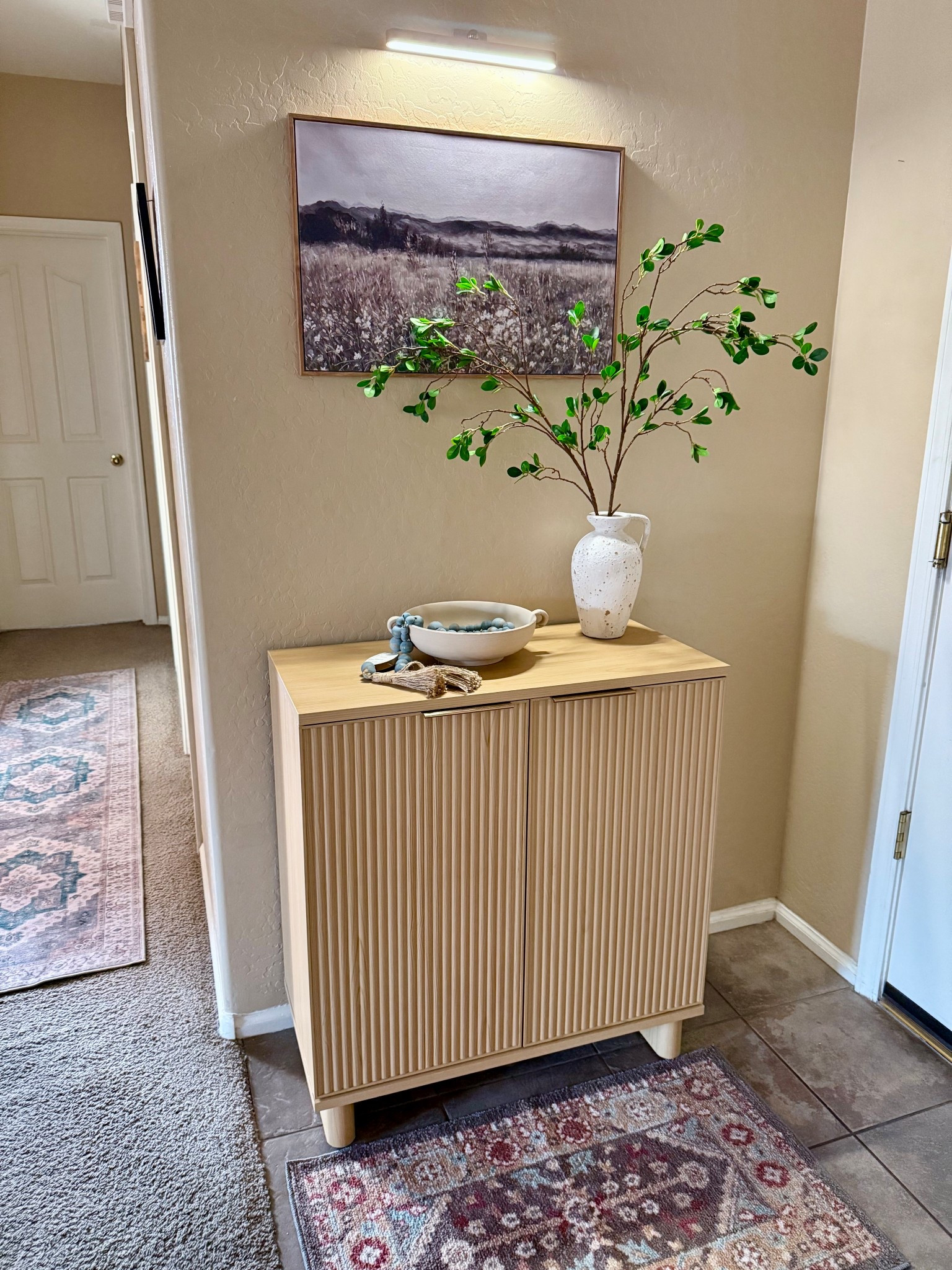Small entryway idea. Cabinet from Walmart, Better Homes & Gardens brand. 





Walmart home finds, Walmart cabinet, framed art, Amazon distressed vase, Amazon stems, 

#LTKSeasonal #LTKHome #LTKFamily