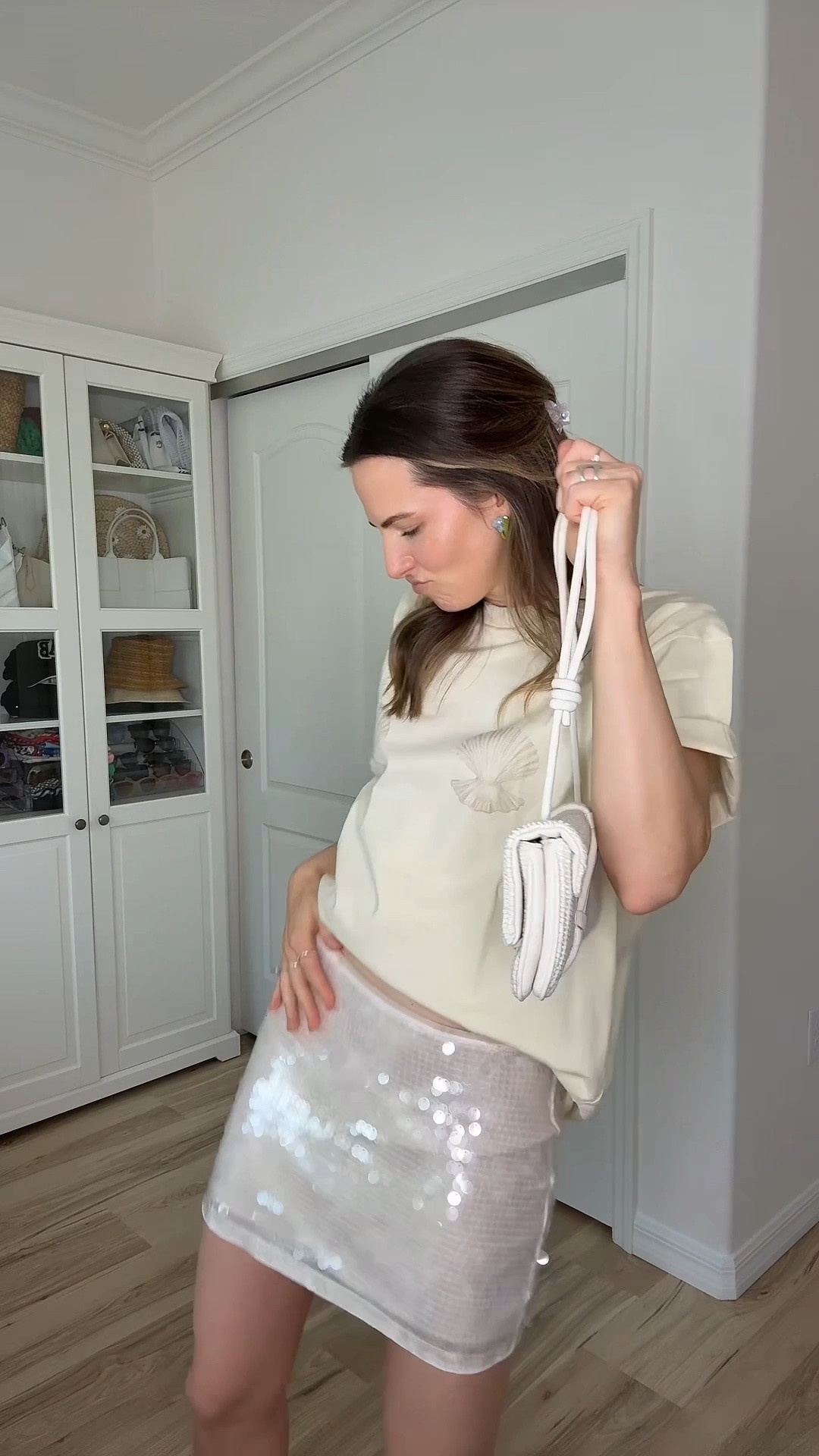 soooo if you're looking for vacation outfits that give beach girl energy & actually works for every occasion... it's this sequin skirt!
i have worn it 500 times this summer alone. beach dinners, nights out, even dressed down.  the easy outfit formula: sequin mini + simple top + sandals and you're giving that effortless beach vacation outfit vibe. styled it here with a little beachy shell coverup tee and raffia sandal heels and i just keep coming back to it
if you're packing for a beach trip and want one piece that does all the heavy lifting, this is the one.🤍

#LTKootd #LTKSeasonal #LTKgrwm