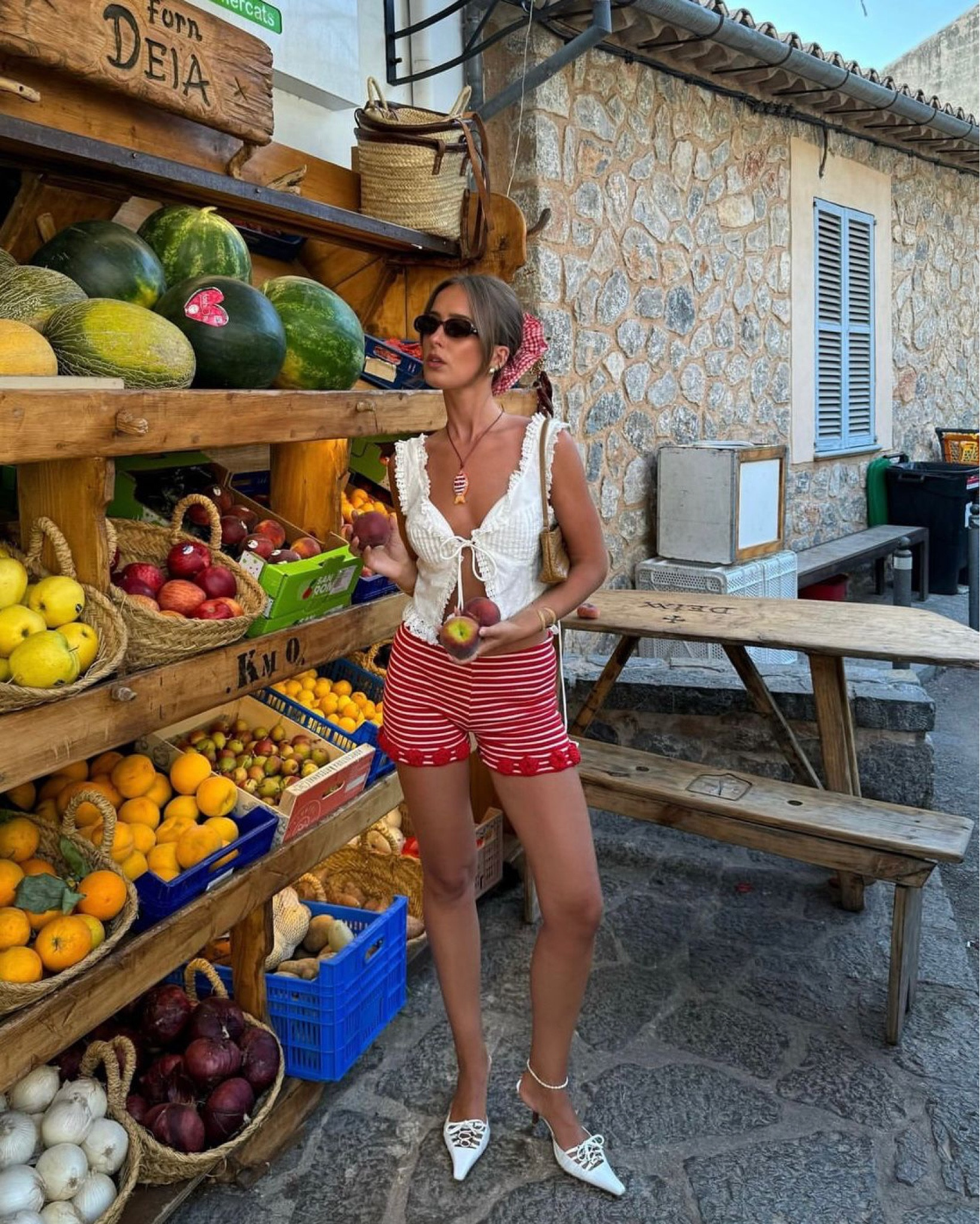 Crochet knit mini shorts, red striped shorts, vintage white mule kitten heels, free people, Anthropologie cami blouse, white tank top, front tie top, fish necklace, holiday outfit, le specs oval sunglasses, summer, beach, city break, vacation, mini brown shoulder bag

#LTKuk #LTKsummer #LTKeurope