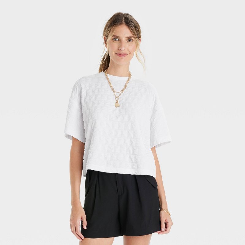 Women&#39;s Bell Short Sleeve Quilted Boxy T-Shirt - A New Day&#8482; White S | Target