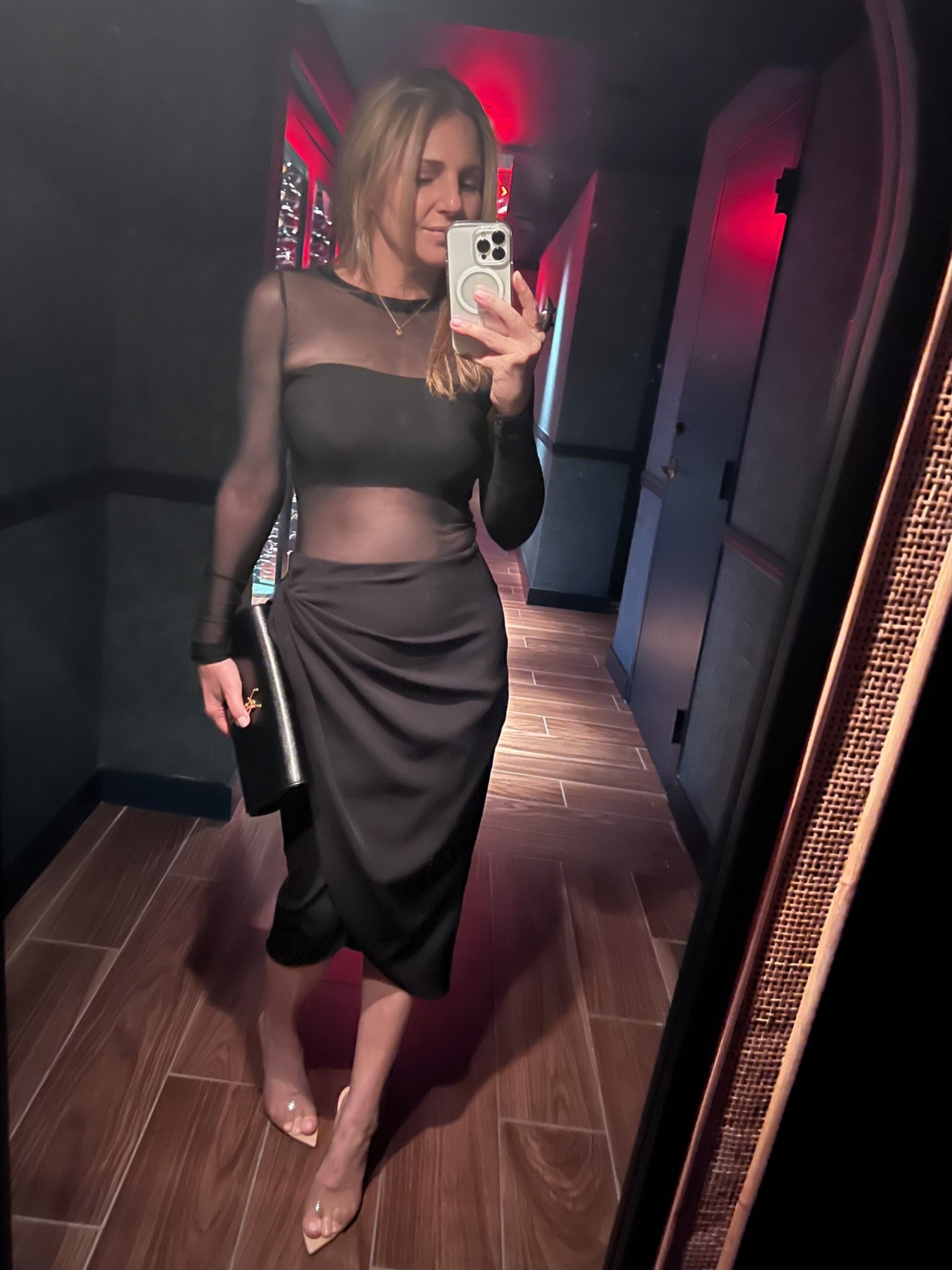 NYE, cocktail party outfit: wearing a black long sleeve sheer mesh top w a black bandeau underneath, a black faux wrap midi skirt + nude high heel sandal mules.

#LTKSaleAlert #LTKWedding #LTKootd