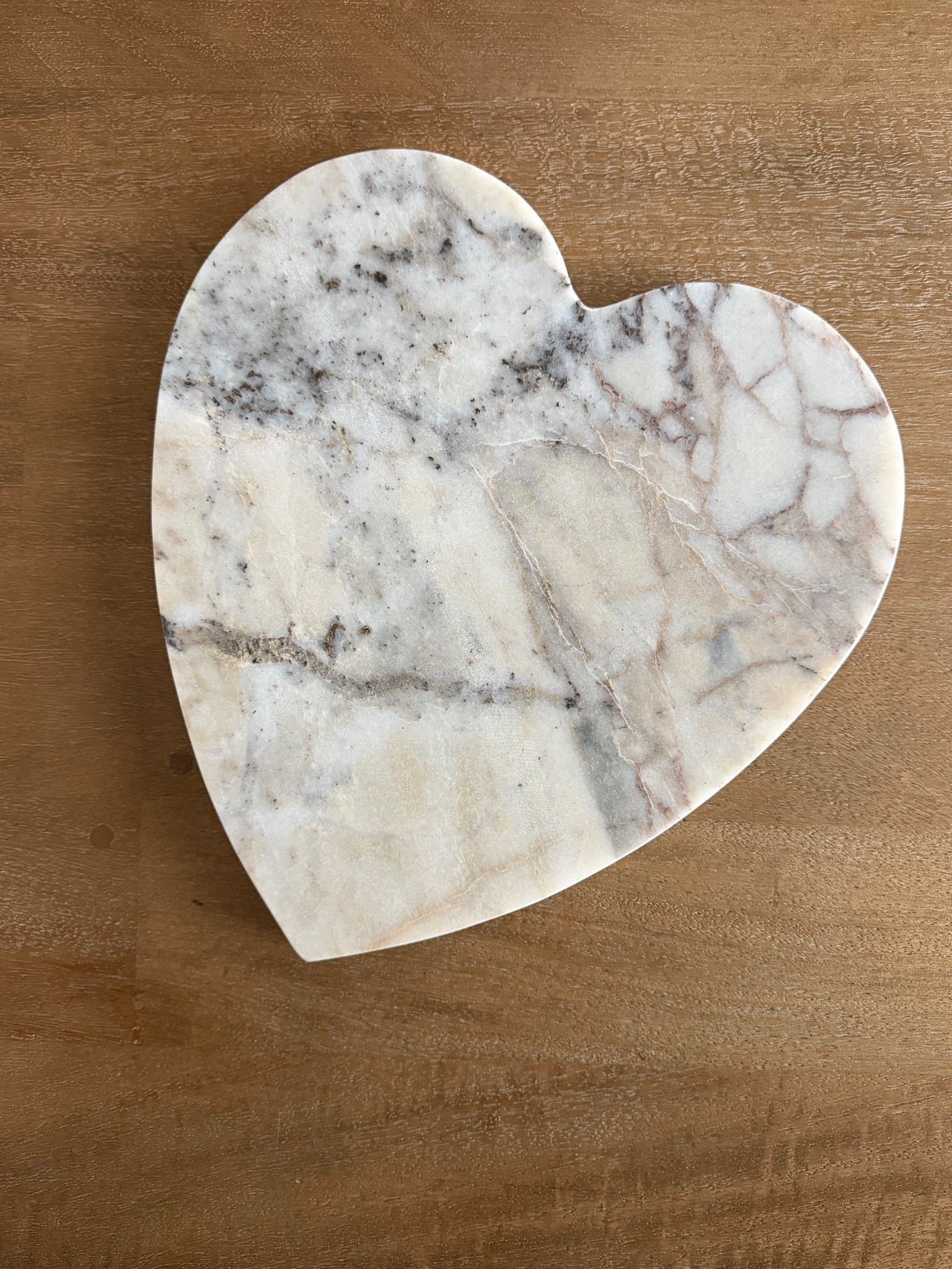 This marble heart shaped board is so good and is only $30! The price is insane for the heft and quality of this! Highly recommend going to see them in stores because due to the nature of marble, there’s a lot of variation in what you get!

#LTKHome #LTKSeasonal #LTKFindsUnder50