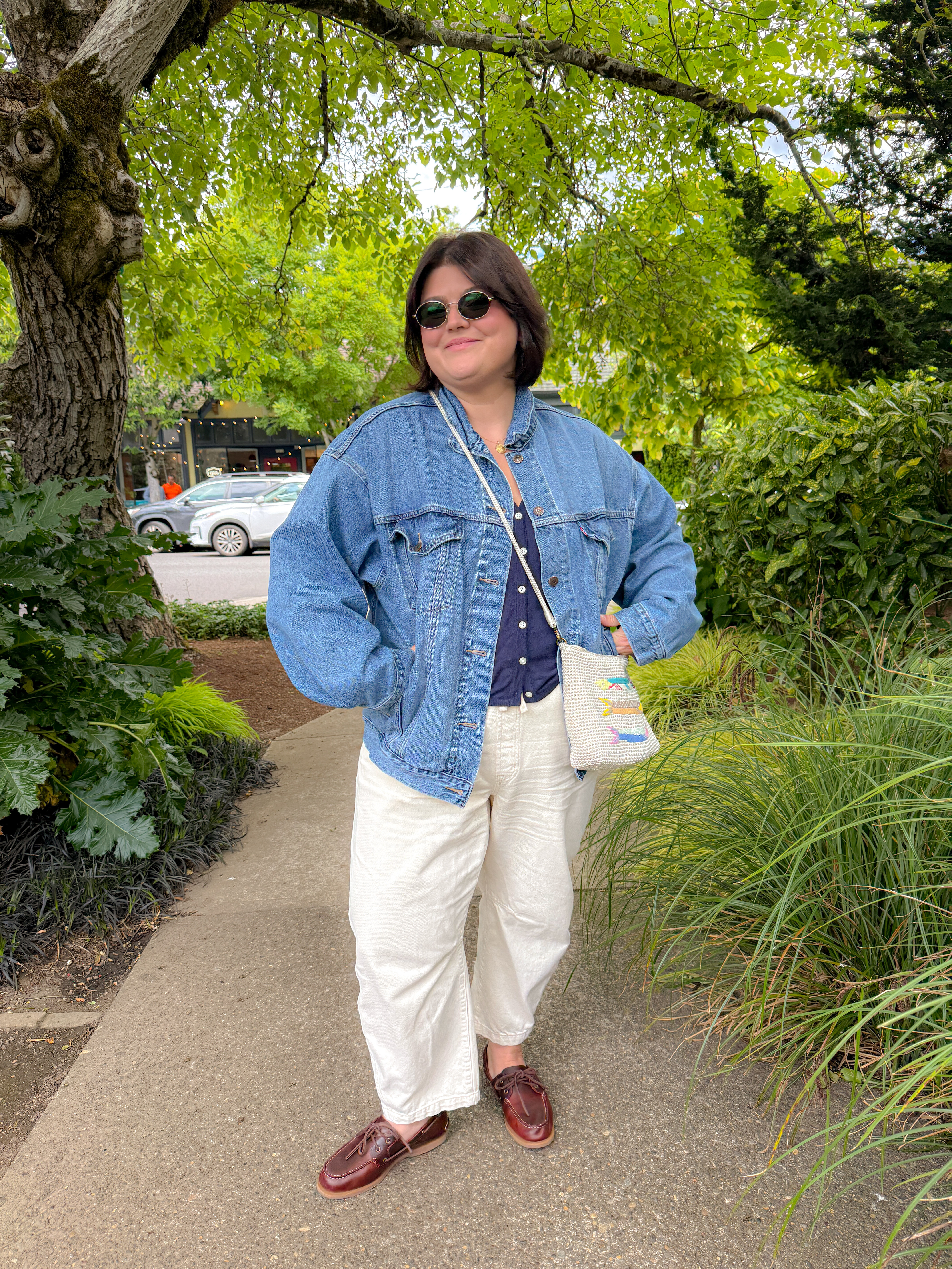 Oversized denim jacket, navy button-up, cream wide-leg pants: my favorite formula for a coastal morning that starts chilly and warms up by noon. Sized up on the jacket on purpose so it layers over everything without feeling tight, and the boat shoes keep the whole thing from looking too dressed up. Pretty much my uniform this trip.
Hashtags

#LTKtravel #LTKstyletip #LTKfindsunder50 #pnwstyle #oregoncoast #denimjacketoutfit #layeredlook #travelstyle #widelegpants #boatshoes 

 