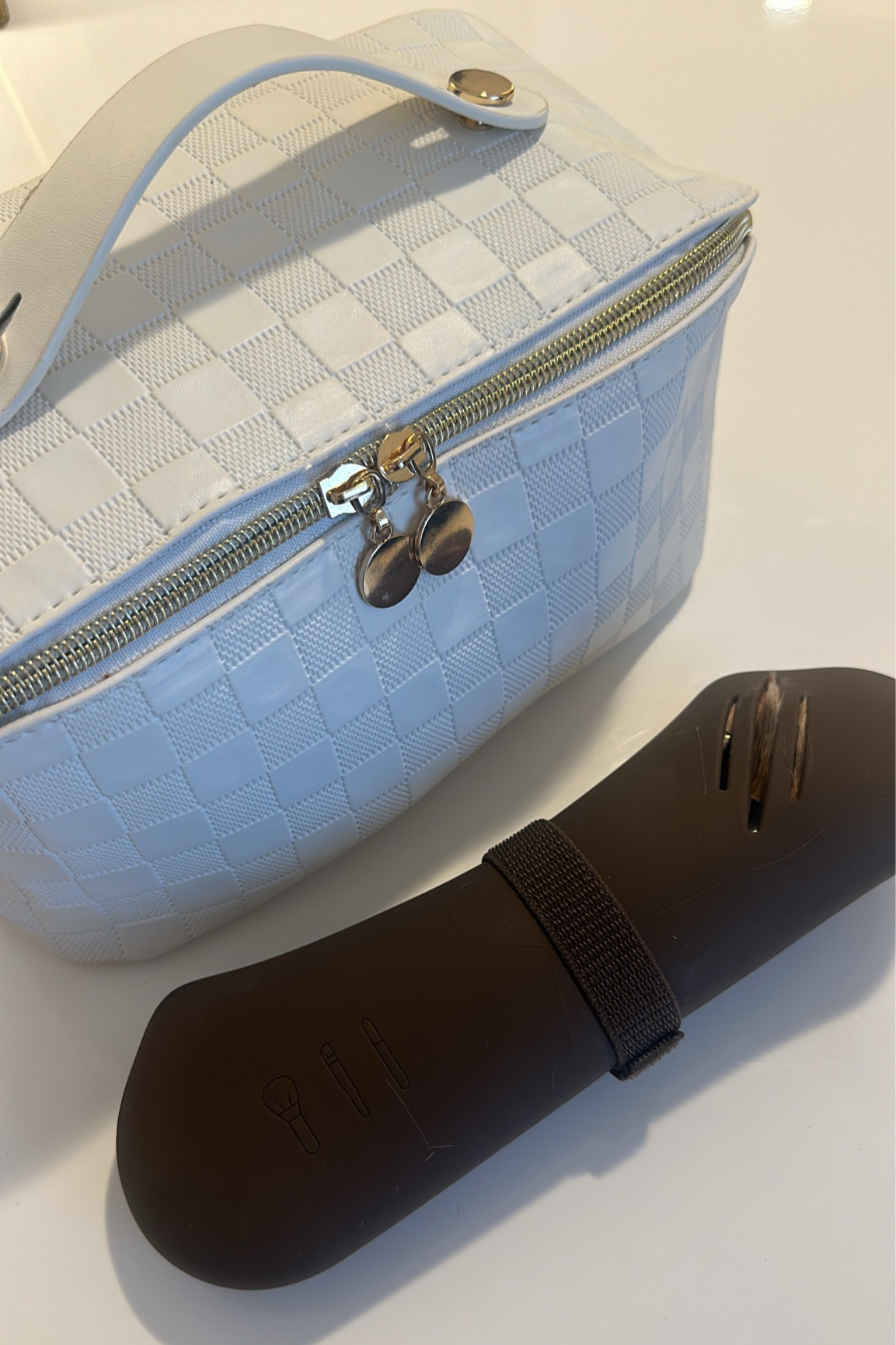 Amazon makeup bag and brush holder 

Designer dupe!! 

#LTKfindsunder50 #LTKbeauty #LTKtravel