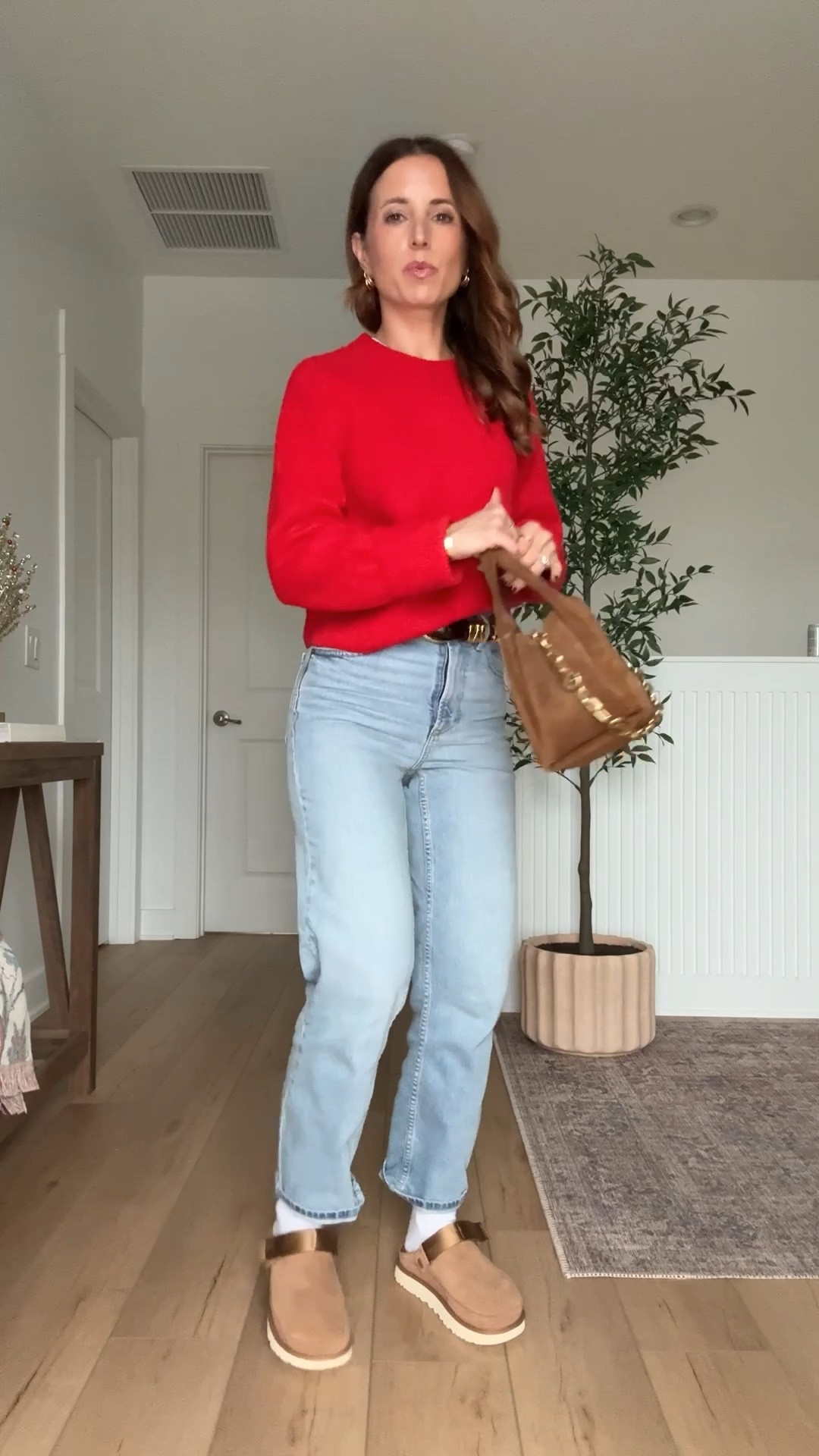 Winter outfit. Casual outfit. My ootd! New Target straight leg jeans in 00 short. Abercrombie sweater in XXS. Ugh Goldenstar clogs - I went up half a size to make room for socks. Coach suede purse. 

#LTKPetite #LTKootd #LTKHoliday