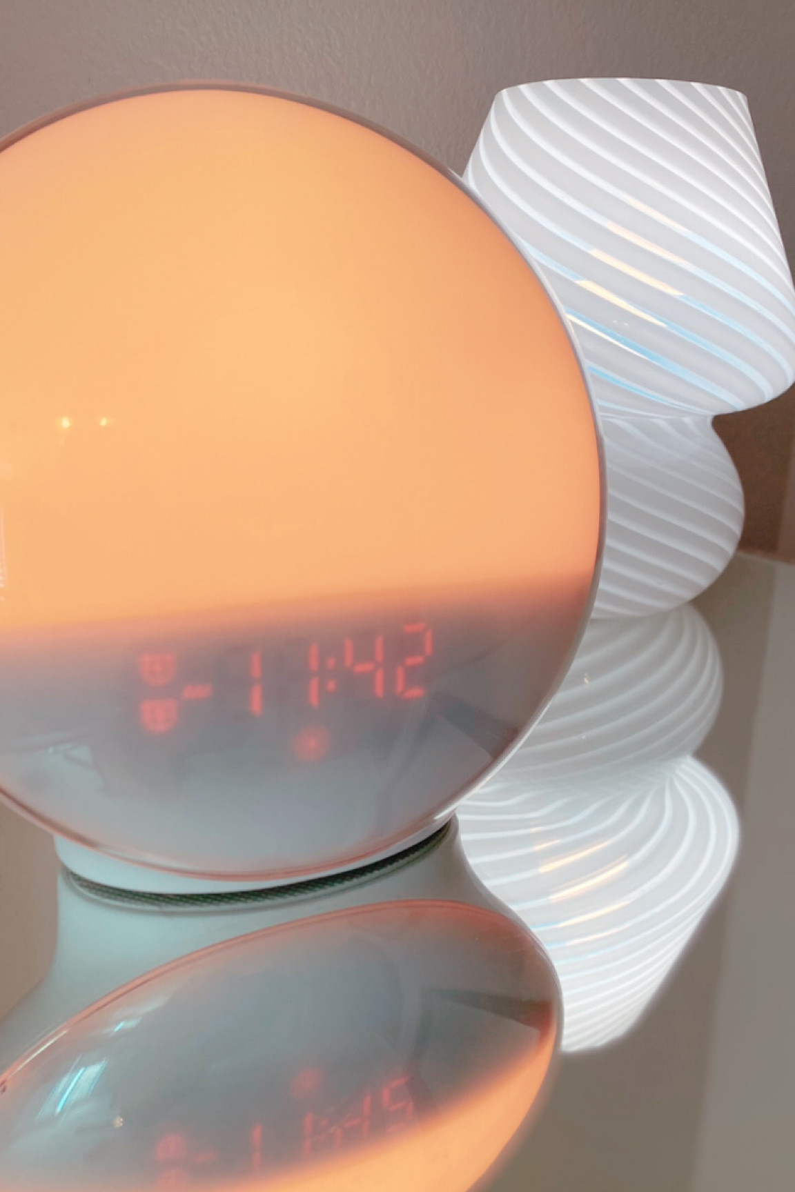 BEST Sunrise|Sunset alarm clock—

If you have trouble sleeping or waking up BUY THIS! It’s on sale right now for only $45 and I’m absolutely in love with it! Corben has to wake up at 3 everyday and he raves about how much this has helped! 
It mimics an actual sunrise or sunset at whatever time you need & also has a few different types of soothing music/sounds to wake up and fall asleep to! I would pay $100 for this thing it is that good! 

#home #homeneeds #alarm #aesthetic #aesthetic home #lamp 

#LTKsalealert #LTKGiftGuide #LTKhome