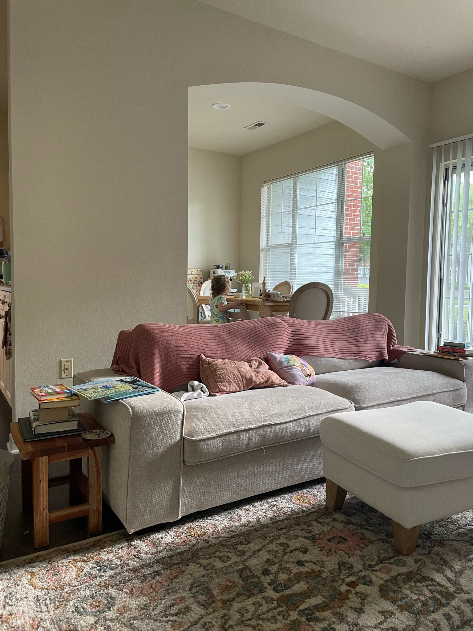 Apartment living room rug & couch 

#LTKHome #LTKFindsUnder100