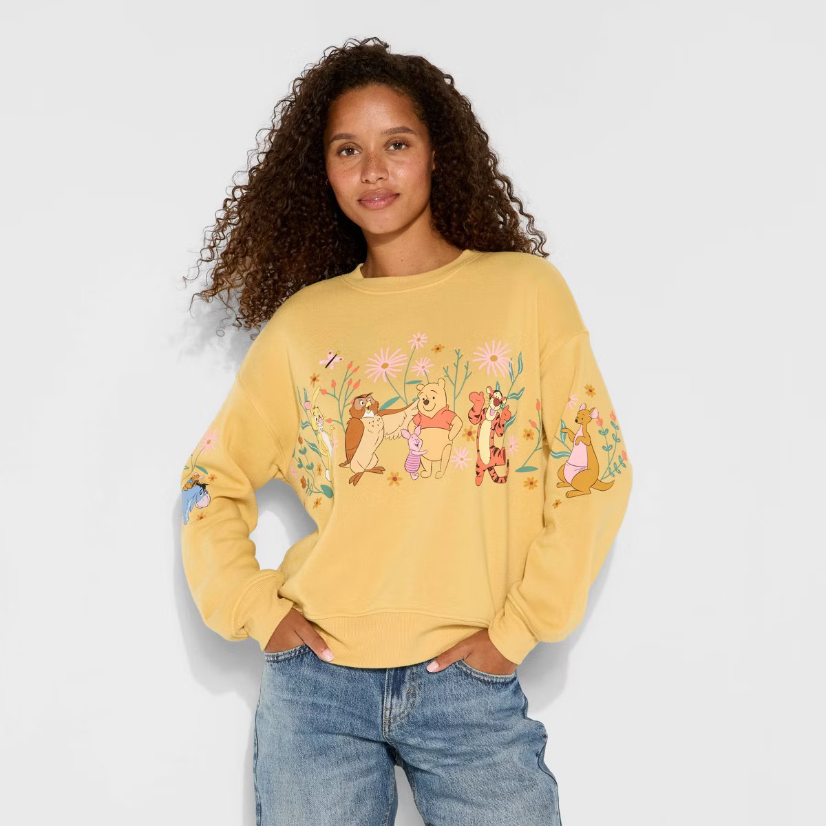 Women's Winnie Fleece Graphic Pullover Sweatshirt - Mustard Yellow | Target