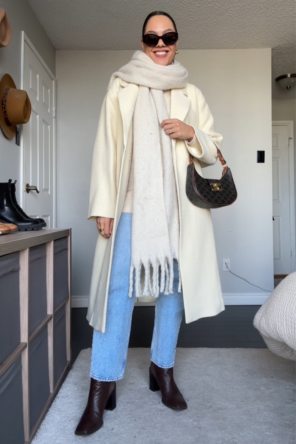 Winter outfit inspiration!
-Aritzia white tie belt wool coat, similar linked   
-Aritzia cream oversized turtleneck sweater, I have a medium. 
-Abercrombie white oversized scarf. 
-Abercrombie light wash jeans. 
-Brown leather ankle boots. 
-Celine Triomphe Ava bag in canvas. 
-Celine sunglasses. 


#LTKstyletip #LTKHoliday #LTKSeasonal